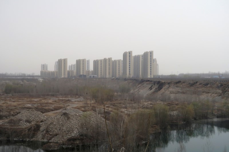 The Taoyuan Xindu Kongquecheng apartment compound developed by China Fortune Land Development is seen in Zhuozhou, Hebei province, China March 19, 2021. Picture taken March 19, 2021. REUTERS/Lusha Zhang/File Photo