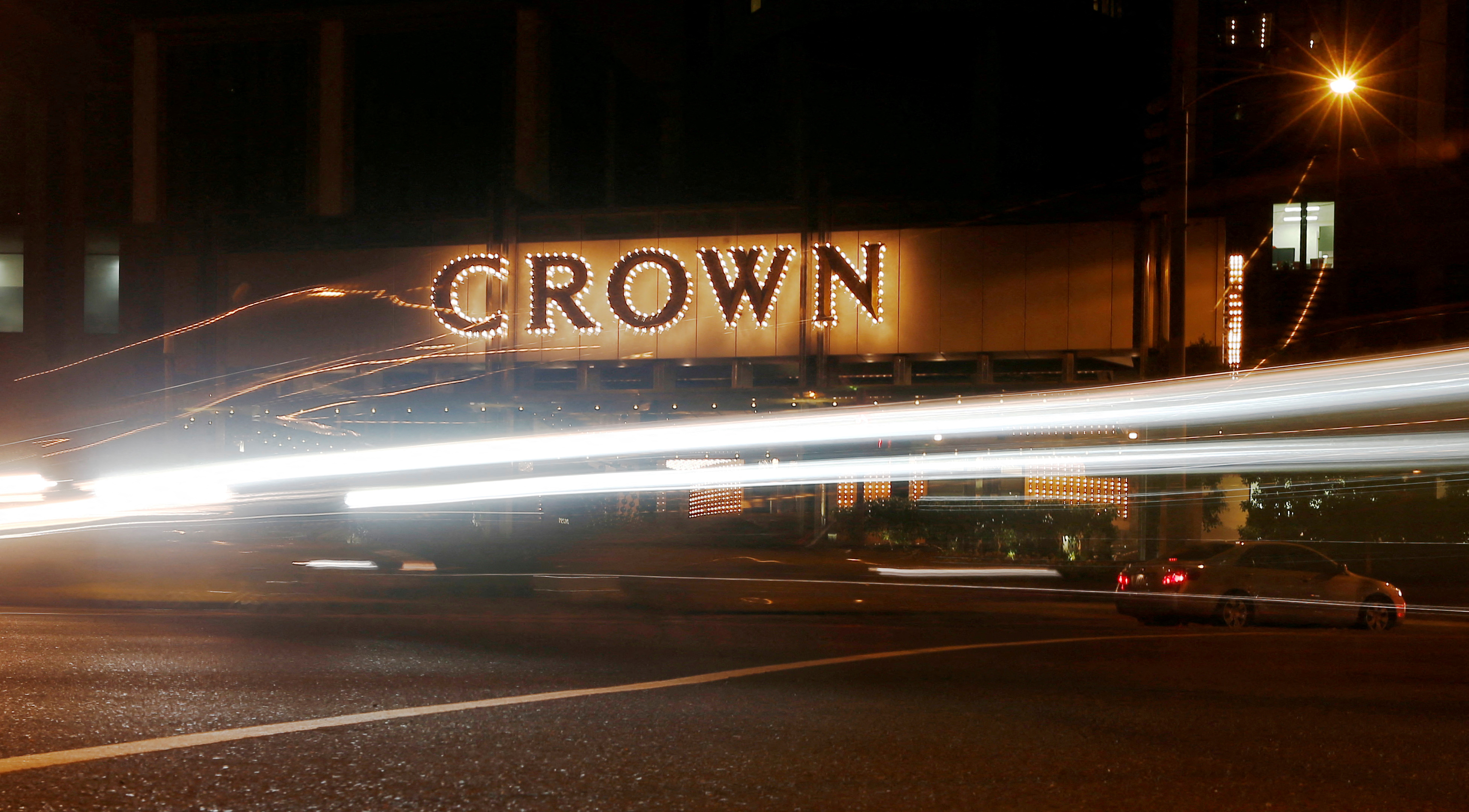 Traffic passes by the Crown Casino complex in Melbourne