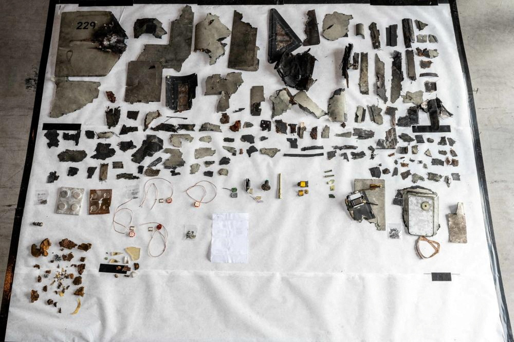 Debris fragments collected as evidence by a U.S. Navy explosive ordnance disposal team aboard M/T Pacific Zircon from an Iranian-made Shahed-136 unmanned aerial vehicle, according to U.S. Navy