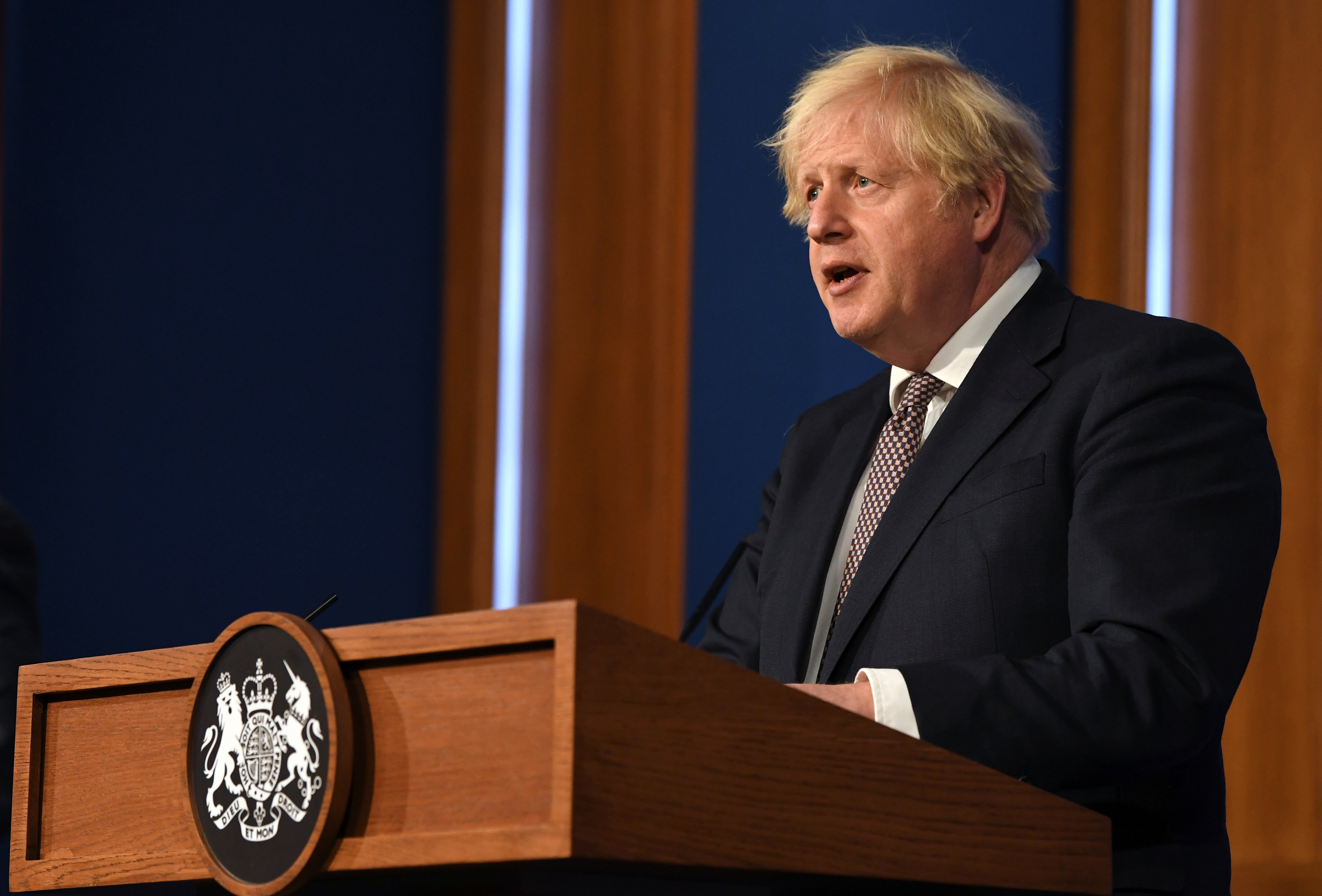 British Prime Minister Boris Johnson holds a news conference for England's COVID-19 lockdown easing announcement in London