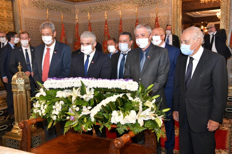 Israeli Foreign Minister Yair Lapid pays his respects at the Mausoleum of Mohammed V in Rabat