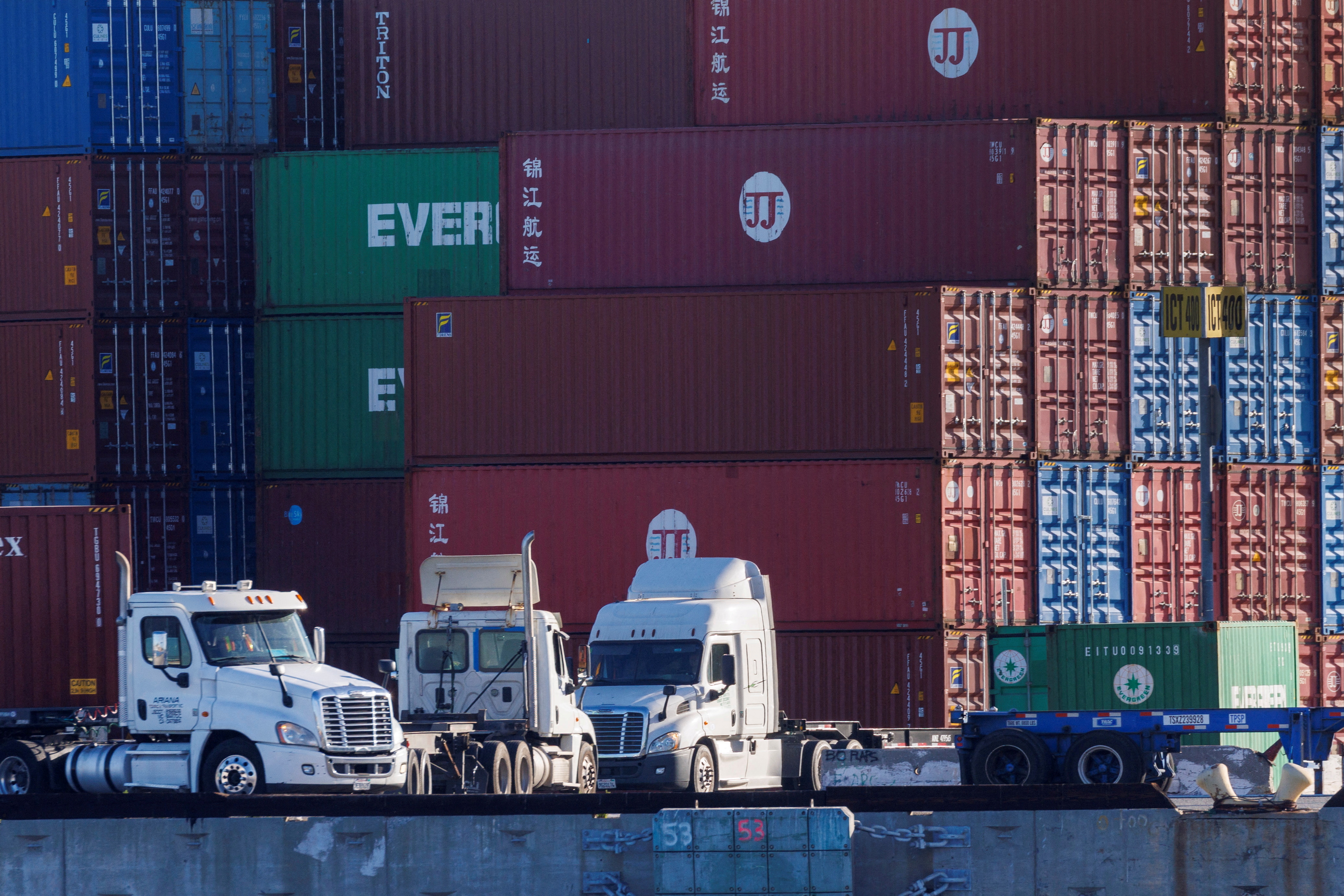 Trucks arrive to pick up containers at the Port of Los Angeles in Los Angeles, California
