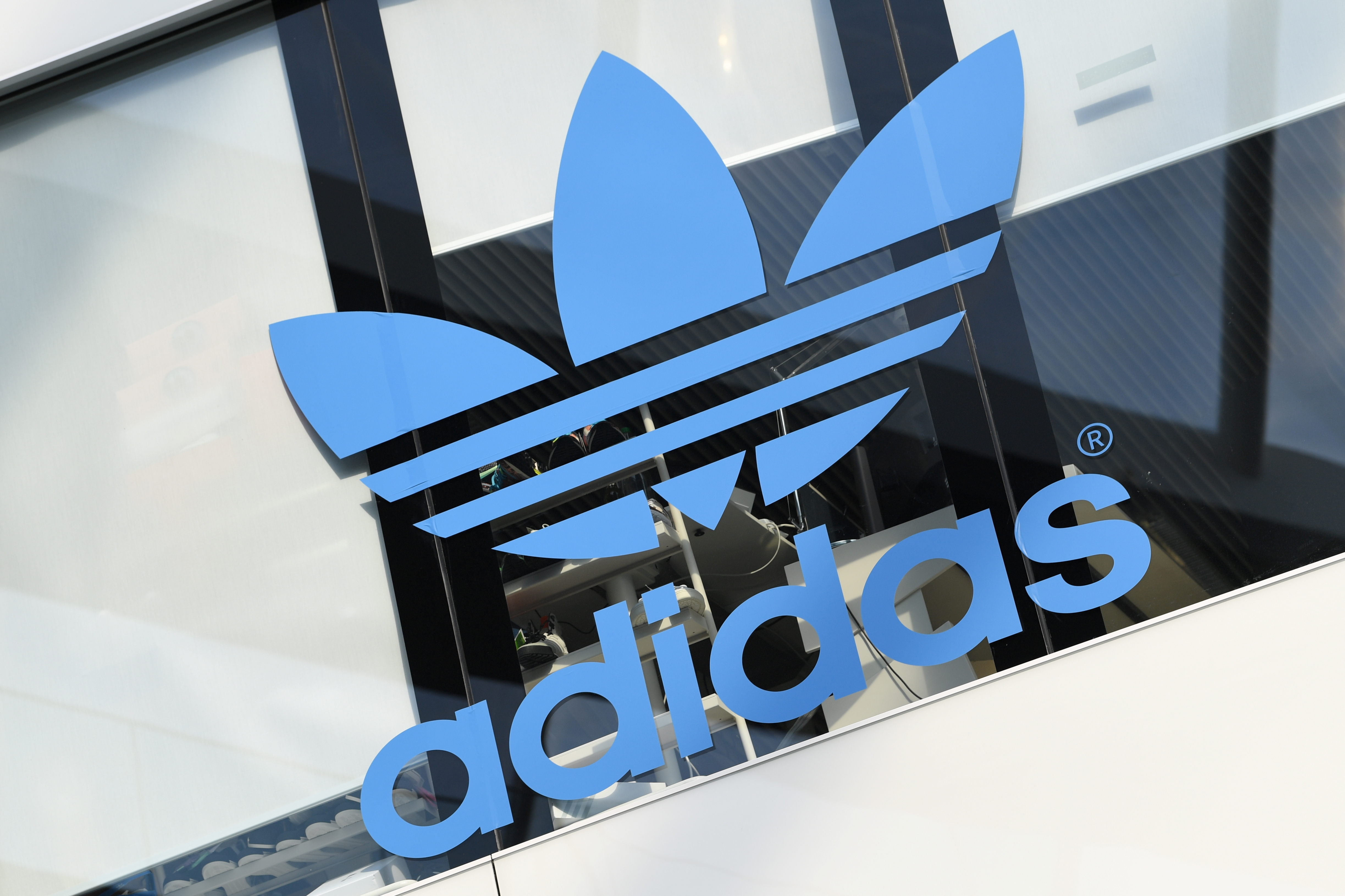 Adidas jumps 5 after second outlook hike strong Q2 Reuters