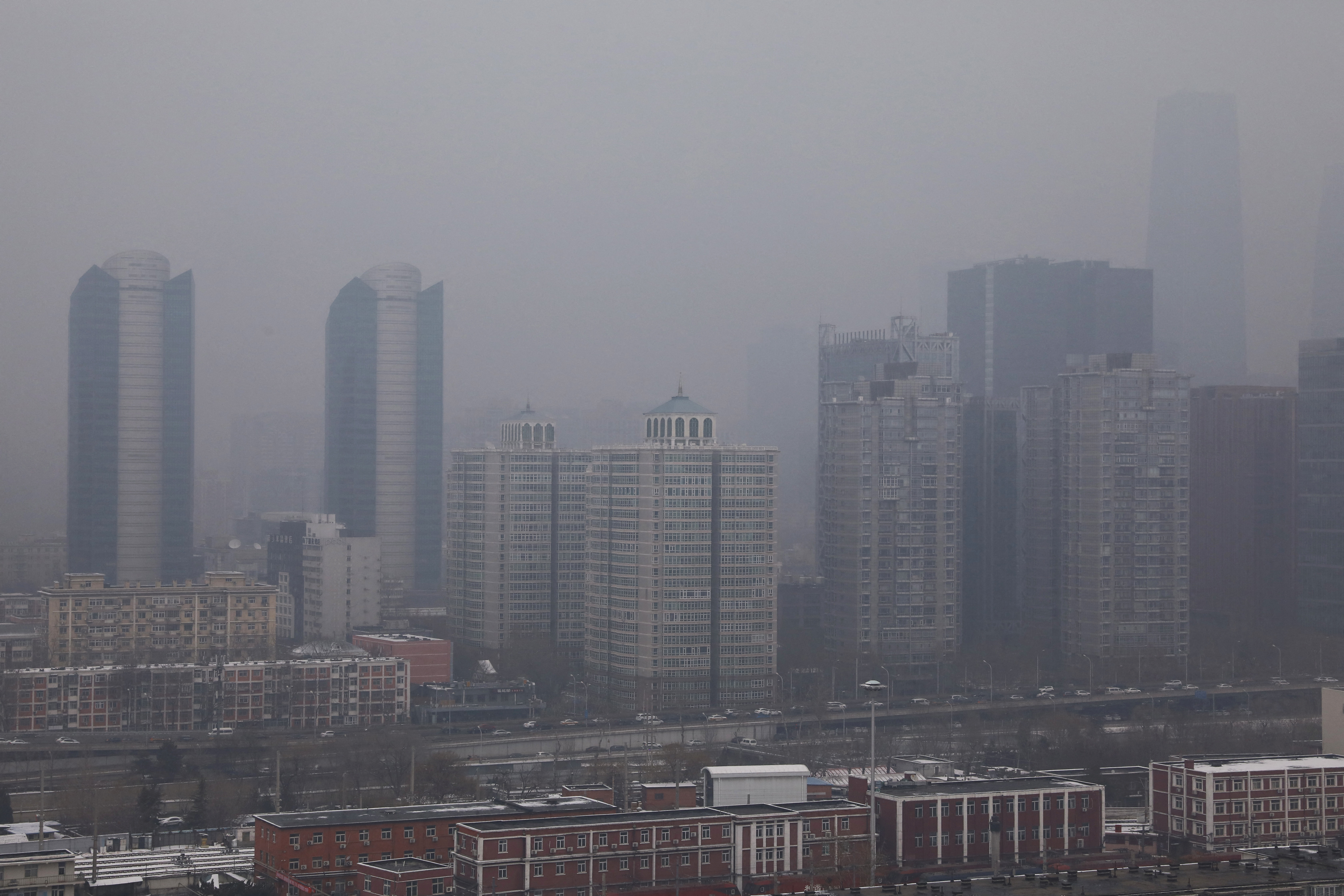 Residential buildings are seen at the Beijing’s Central Business District (CBD) on a smoggy day in Beijing