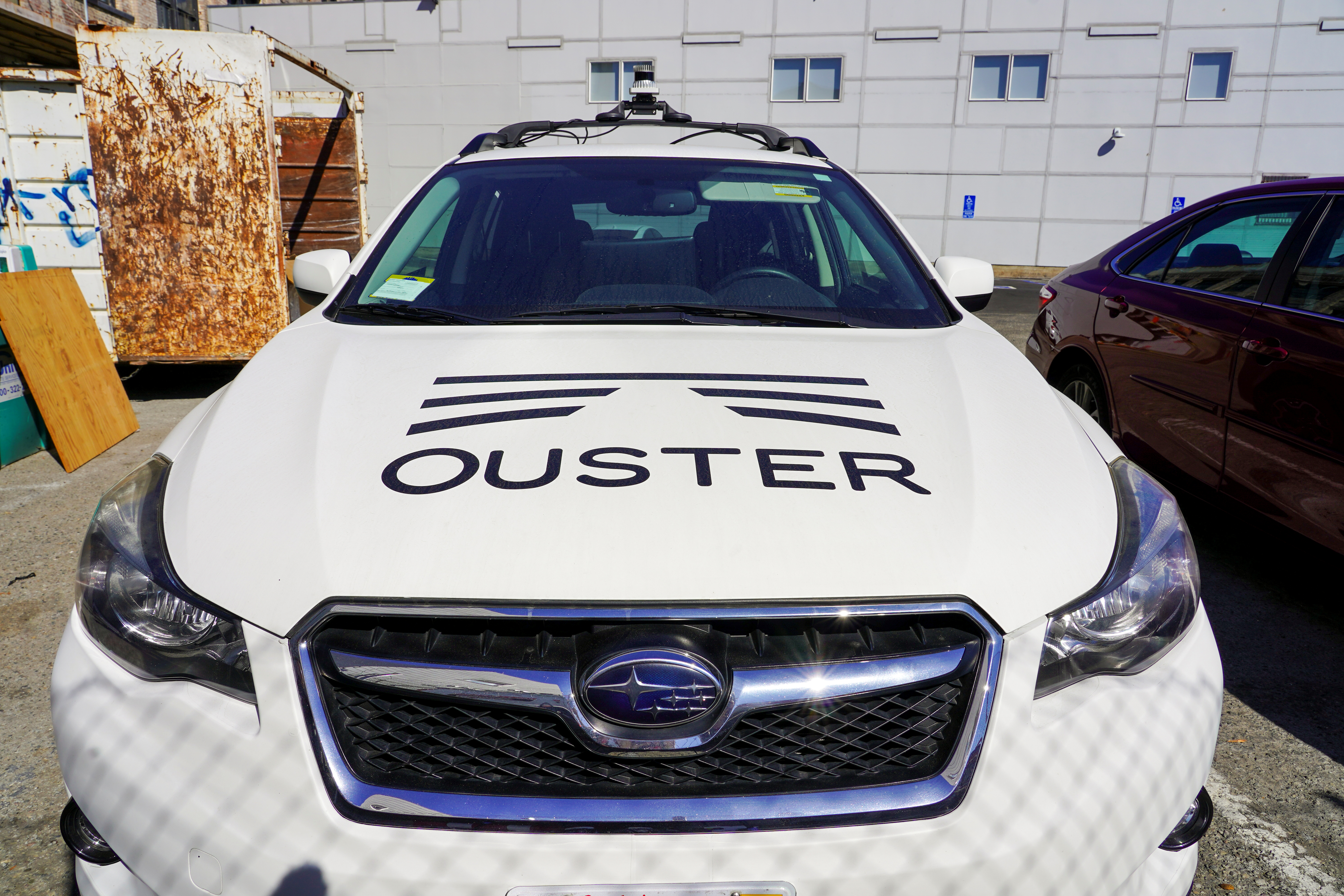 A car outfitted with Ouster's lidar, used in scanning the area on a self-driving vehicle, is parked at the technology company's office in San Francisco