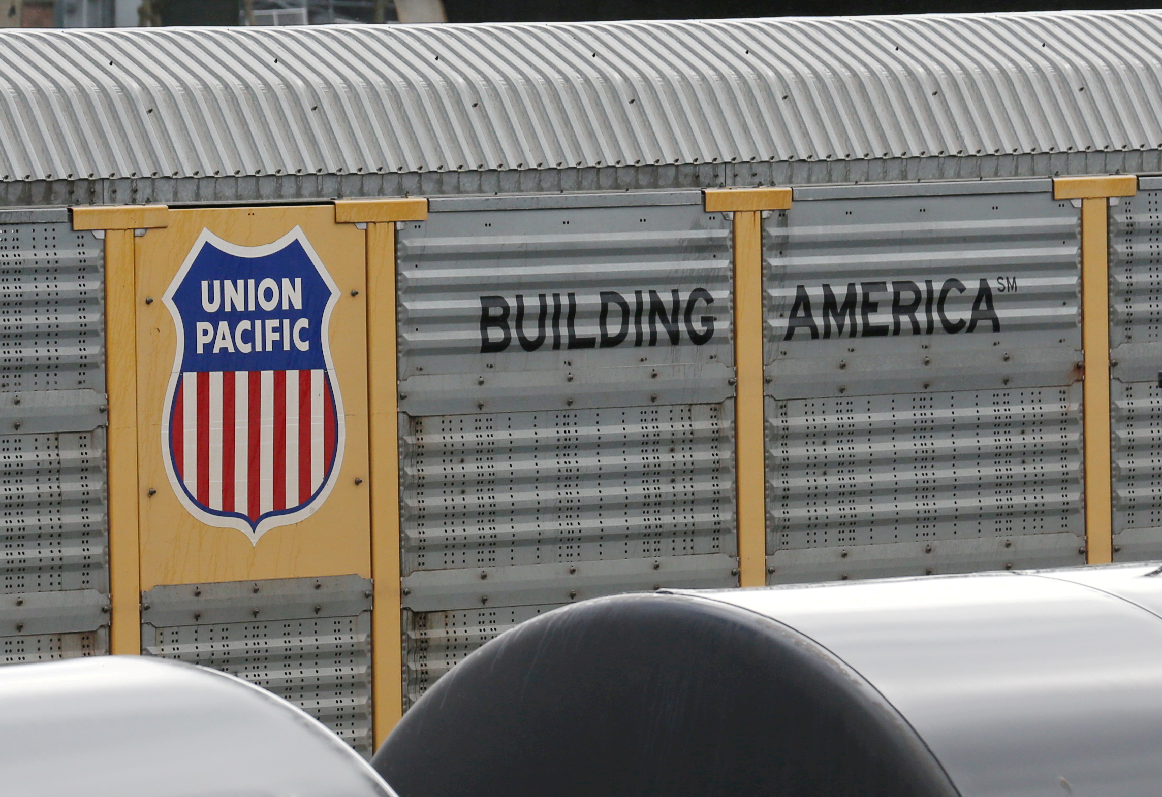 A Union Pacific rail car is parked at a Burlington Northern Santa Fe (BNSF) train yard in Seattle