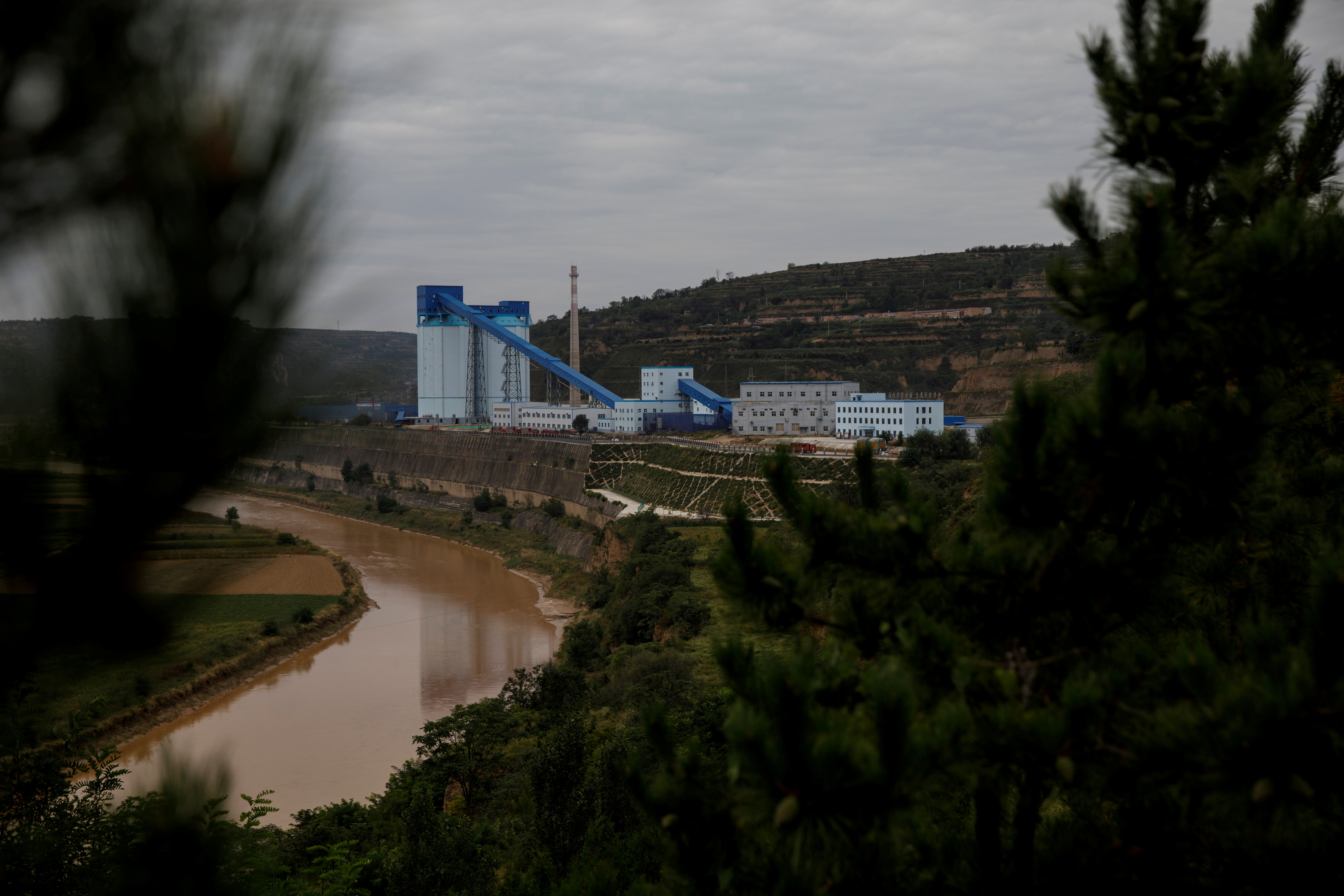 The Walnut Valley coal mine that is part of Huaneng Group's integrated coal power project stands near Qingyang, Ning County, Gansu province, China