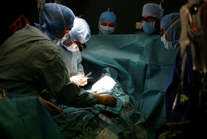 Medical team perform a heart surgery in an operating room at the Saint-Augustin clinic in Bordeaux