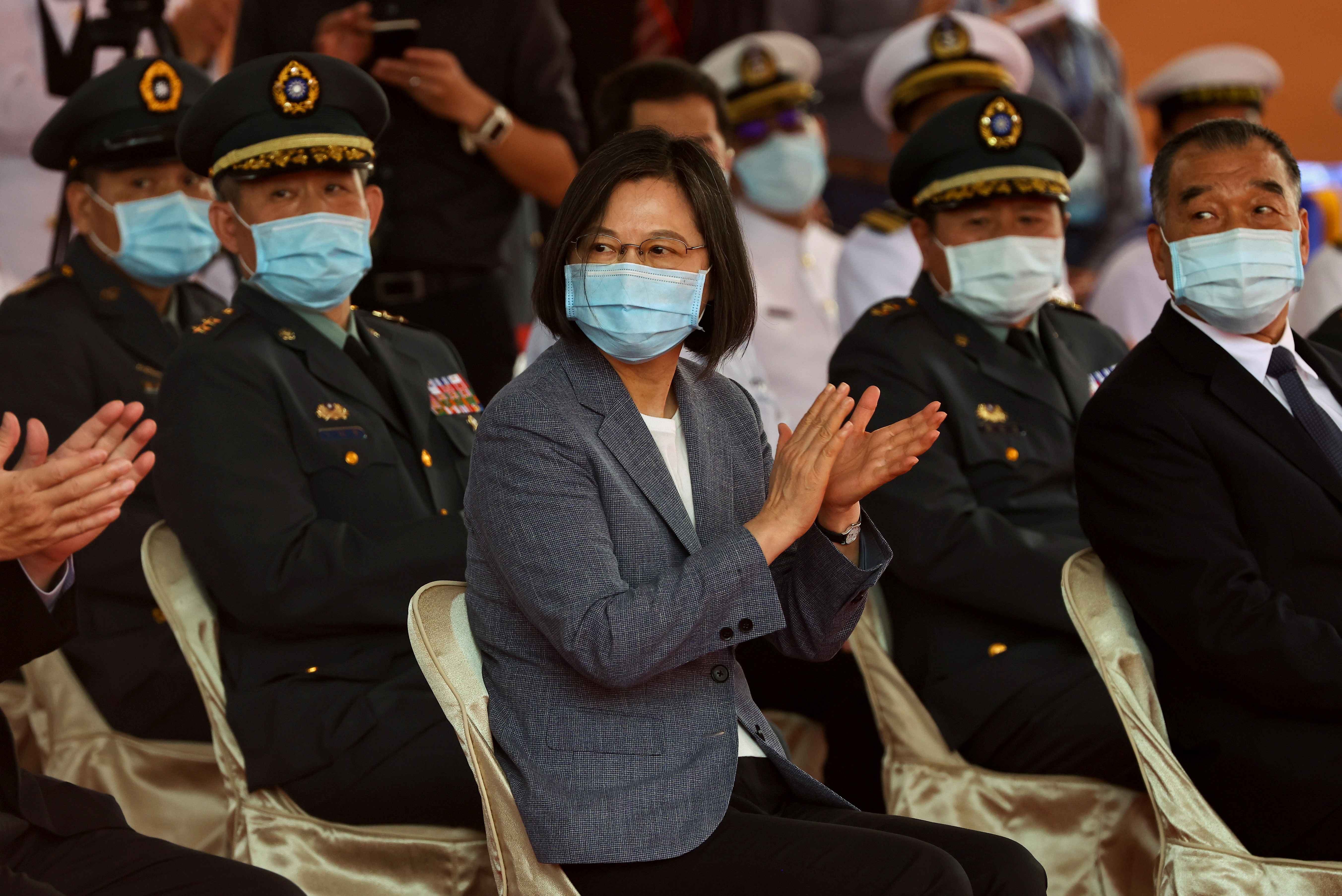 Taiwan's President Tsai Ing-wen applauds during the launch ceremony for Taiwan Navy's domestically built amphibious transport dock 