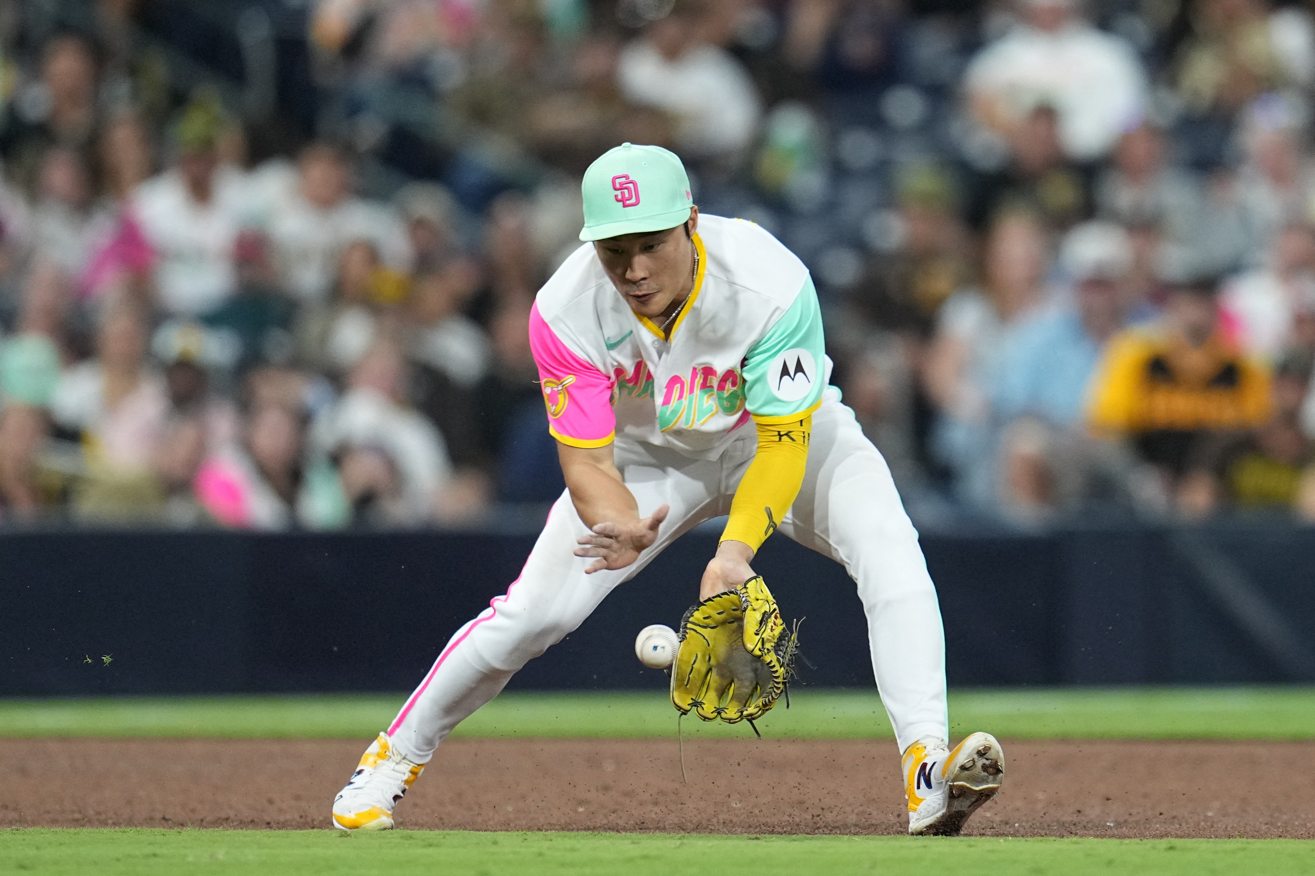 San Diego Padres Jose Azocar takes off his Nike batting gloves