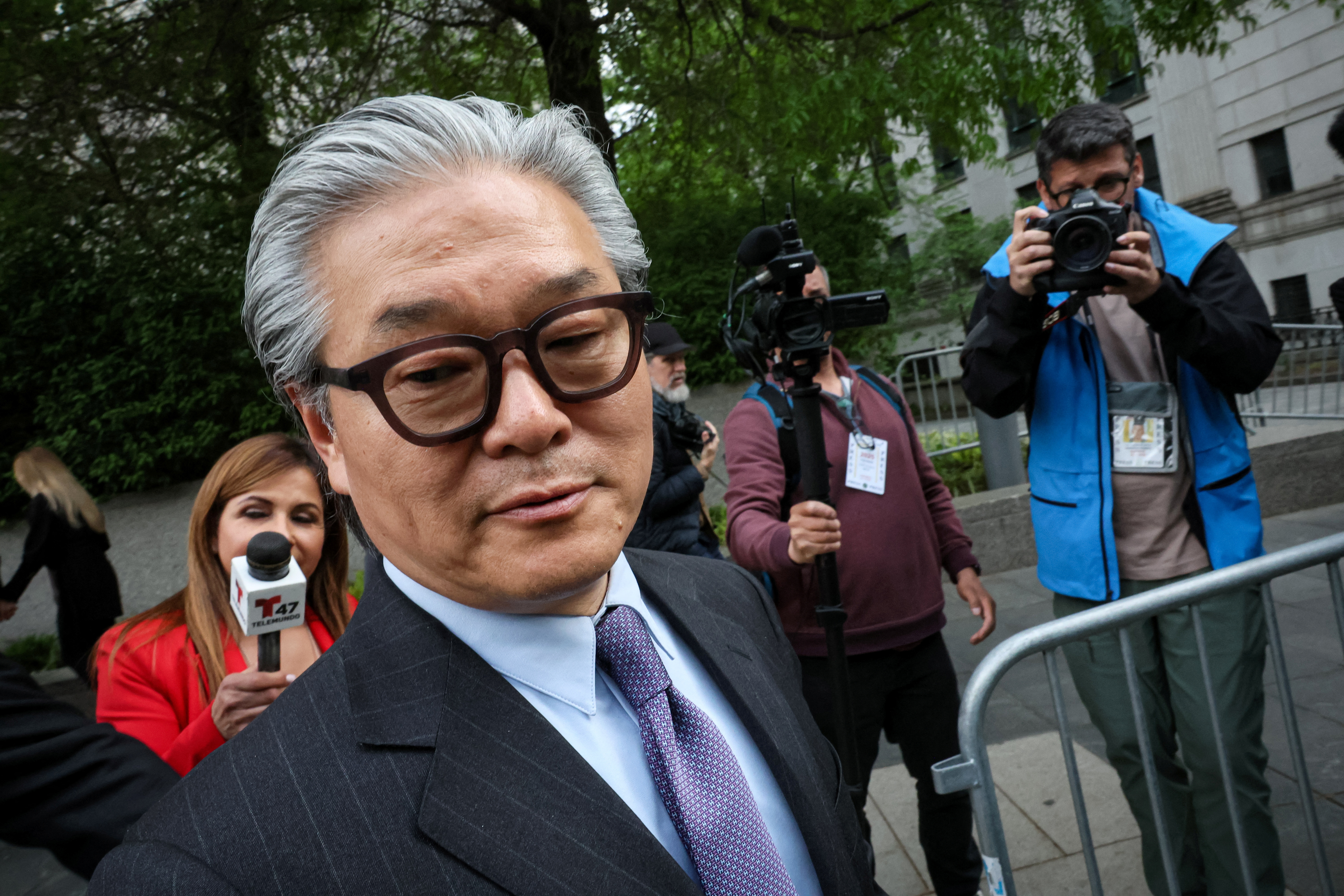 Sung Kook (Bill) Hwang, the founder and head of a private investment firm known as Archegos, exits the Manhattan federal courthouse in New York