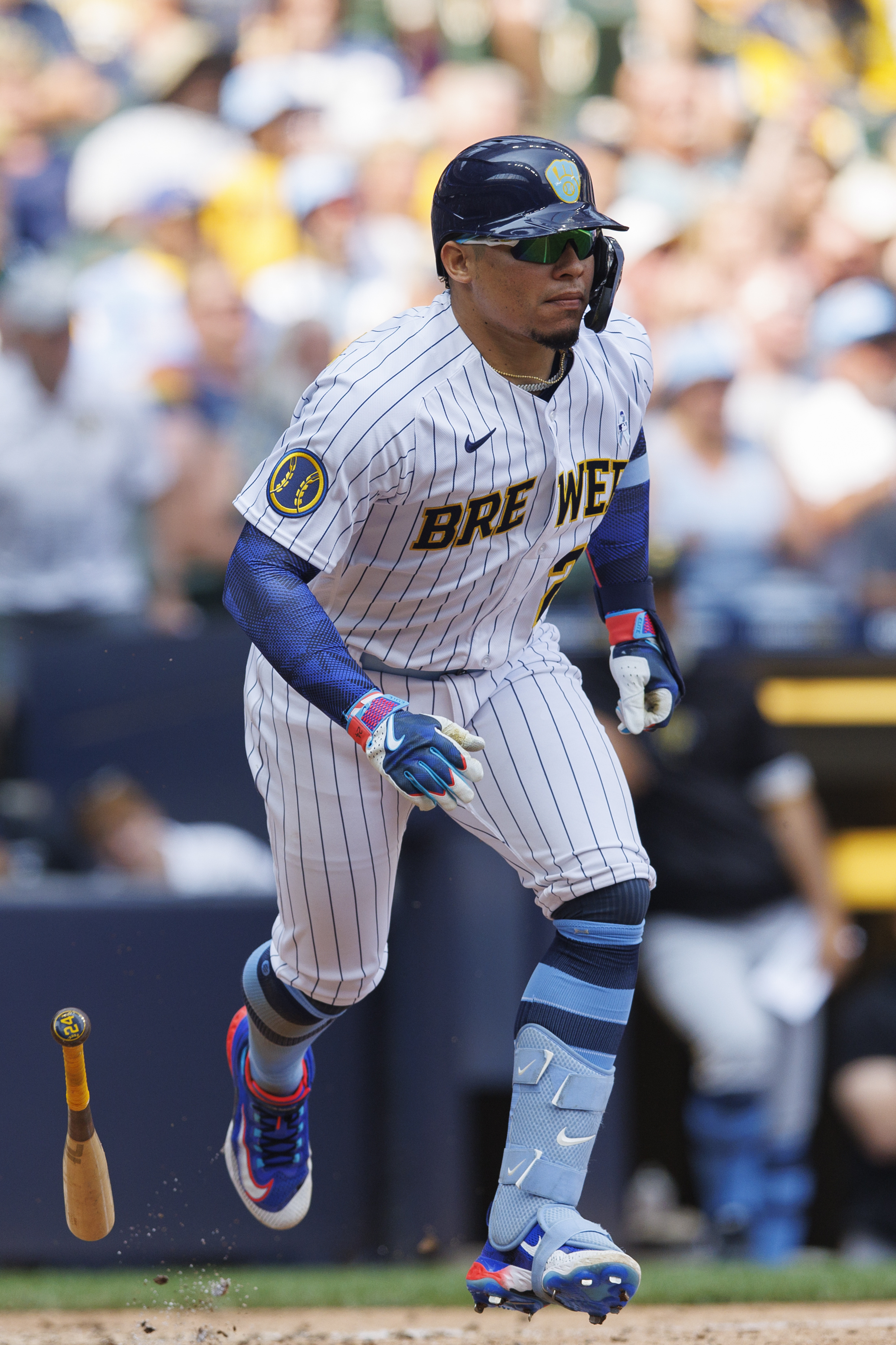 April 8, 2023: Milwaukee Brewers catcher William Contreras (24) hits a ball  during the game between the Milwaukee Brewers and the St. Louis Cardinals  at American Family Field on April 8, 2023