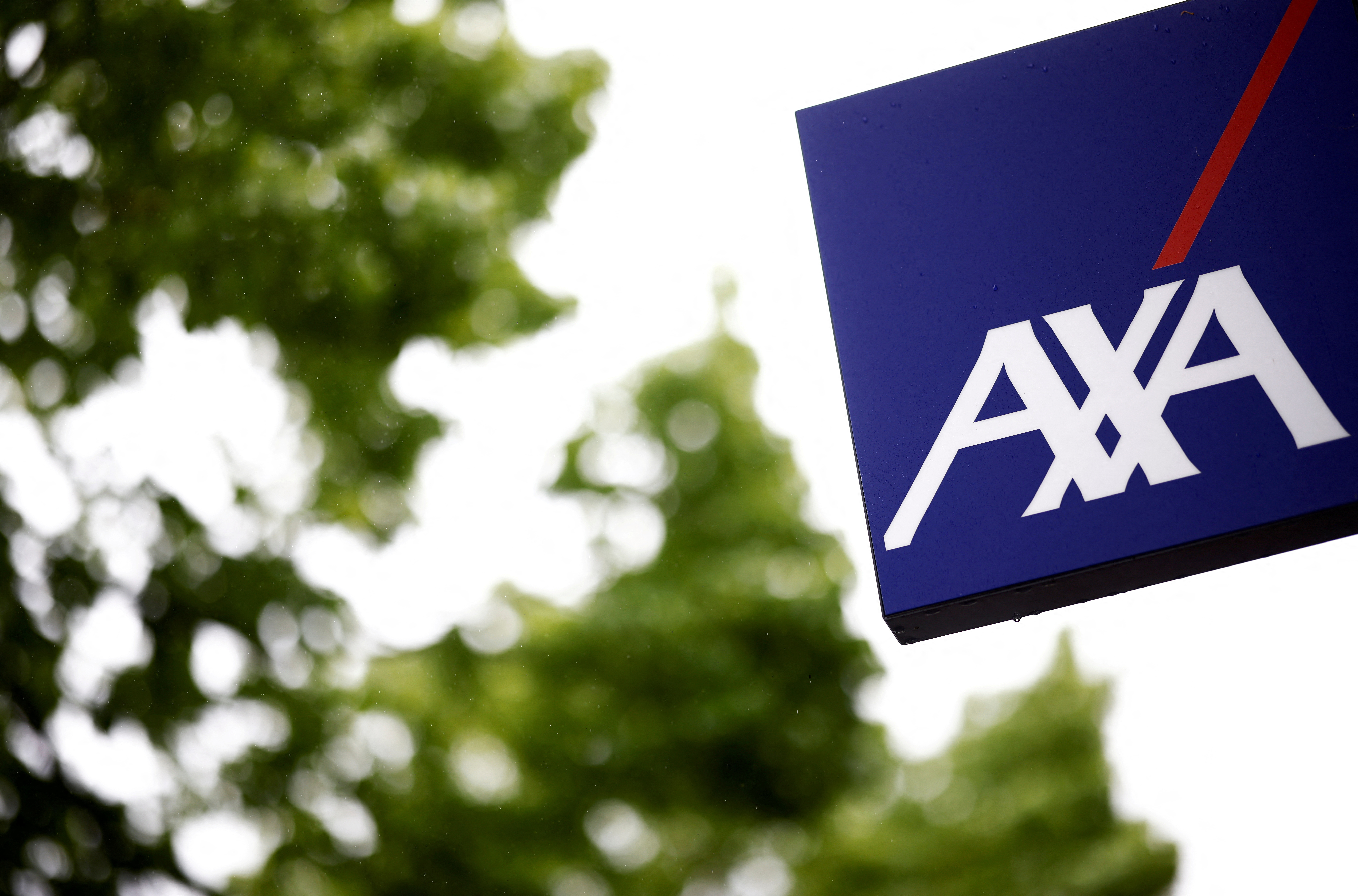 The logo of French Insurer AXA is seen outside a building in Les Sorinieres