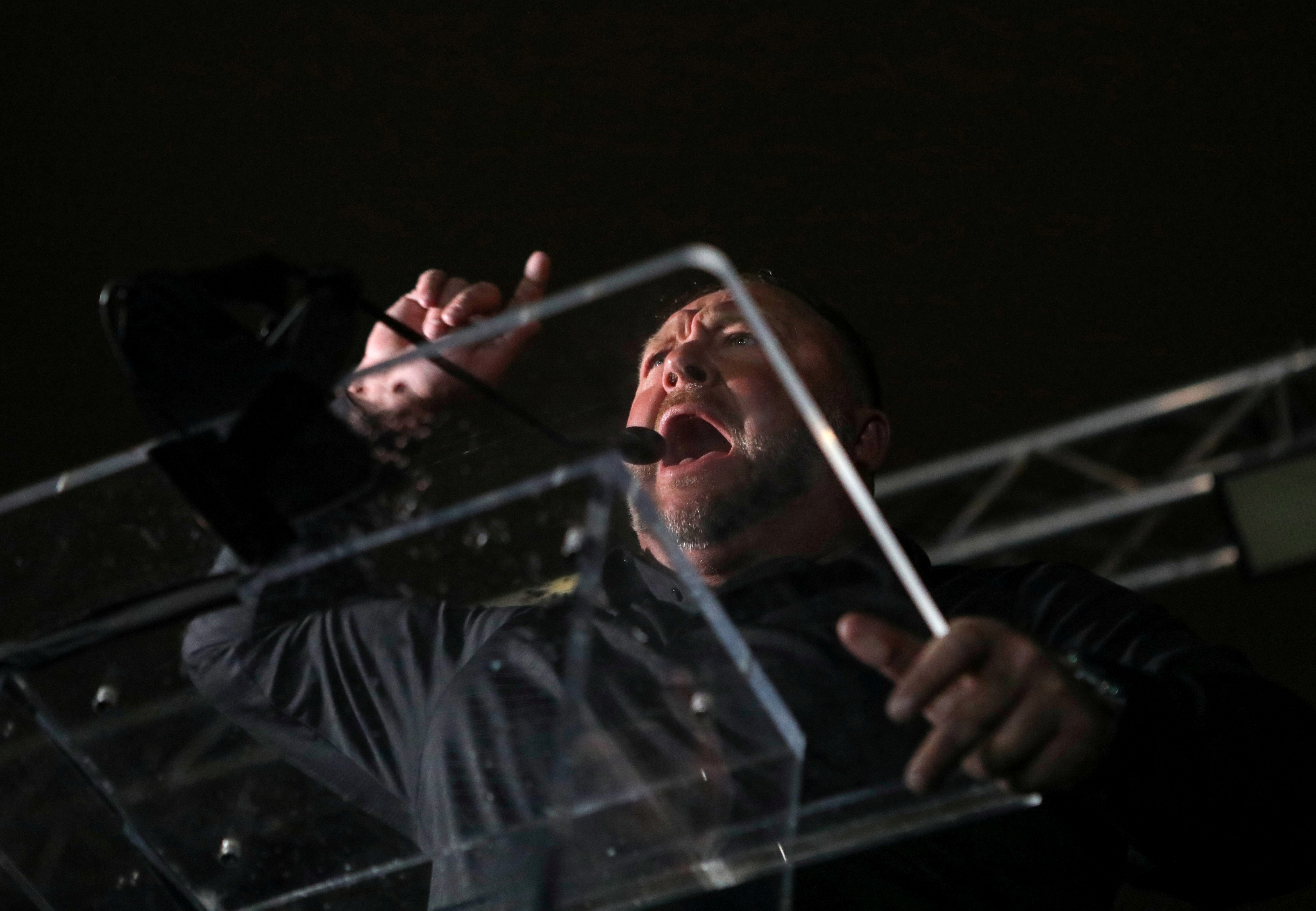 Right-wing radio talk show host Alex Jones speaks during a rally at Freedom Plaza, ahead of the U.S. Congress certification of the November 2020 election results, during protests in Washington, U.S., January 5, 2021. REUTERS/Jim Urquhart