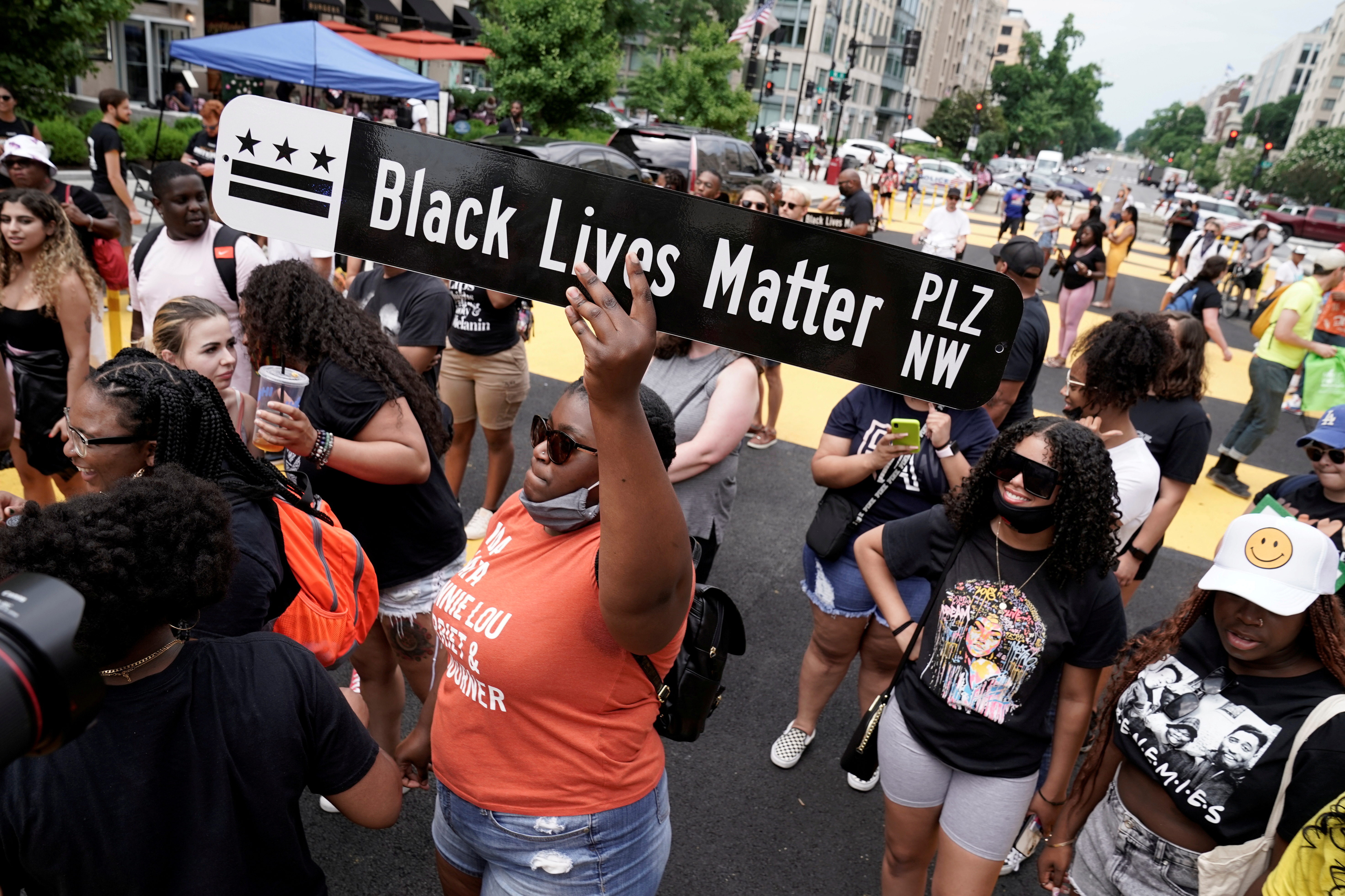 People celebrate Juneteenth at Black Lives Matter Plaza in Washington