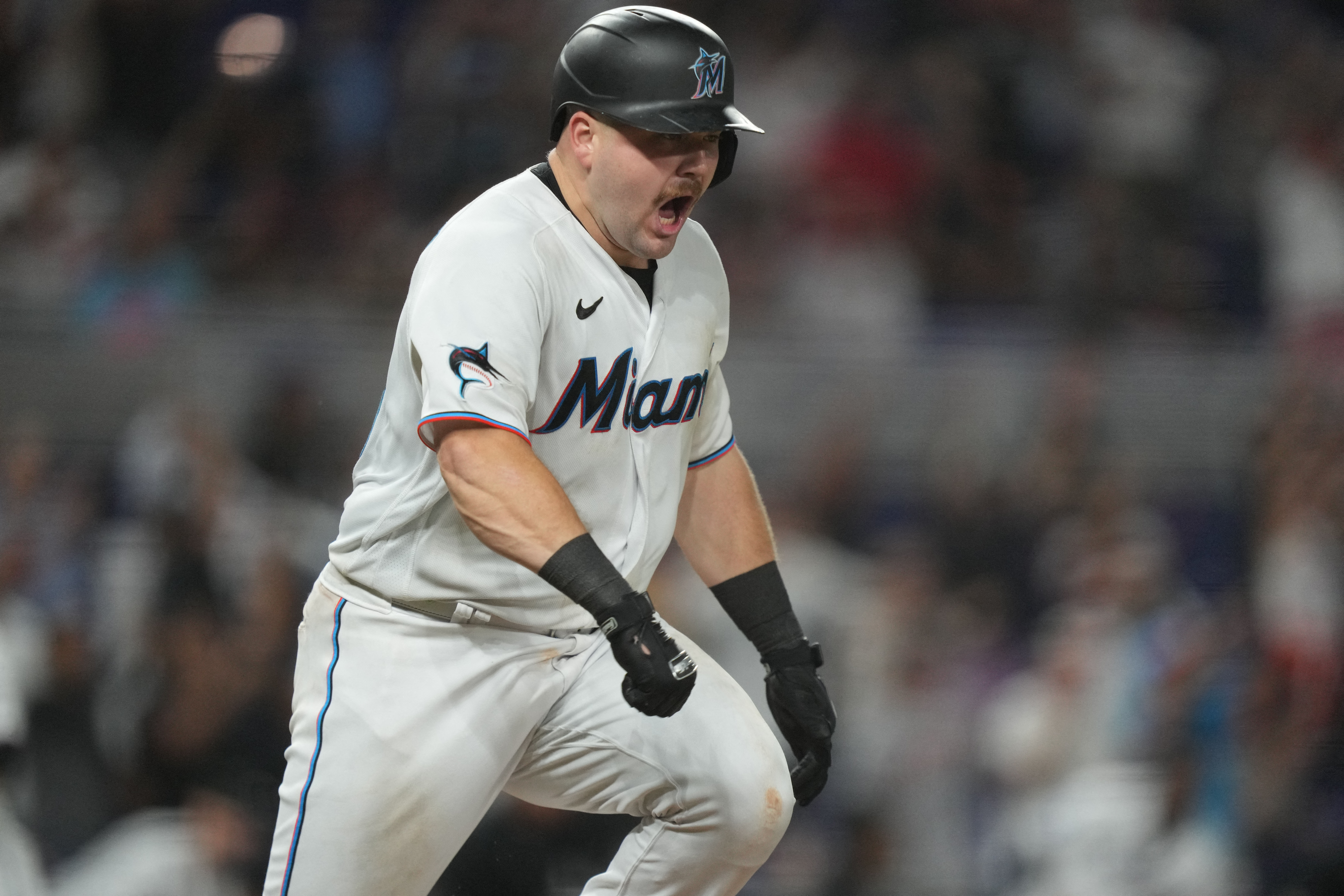 Jake Burger of the Miami Marlins reacts to the third out during a 3-1  News Photo - Getty Images
