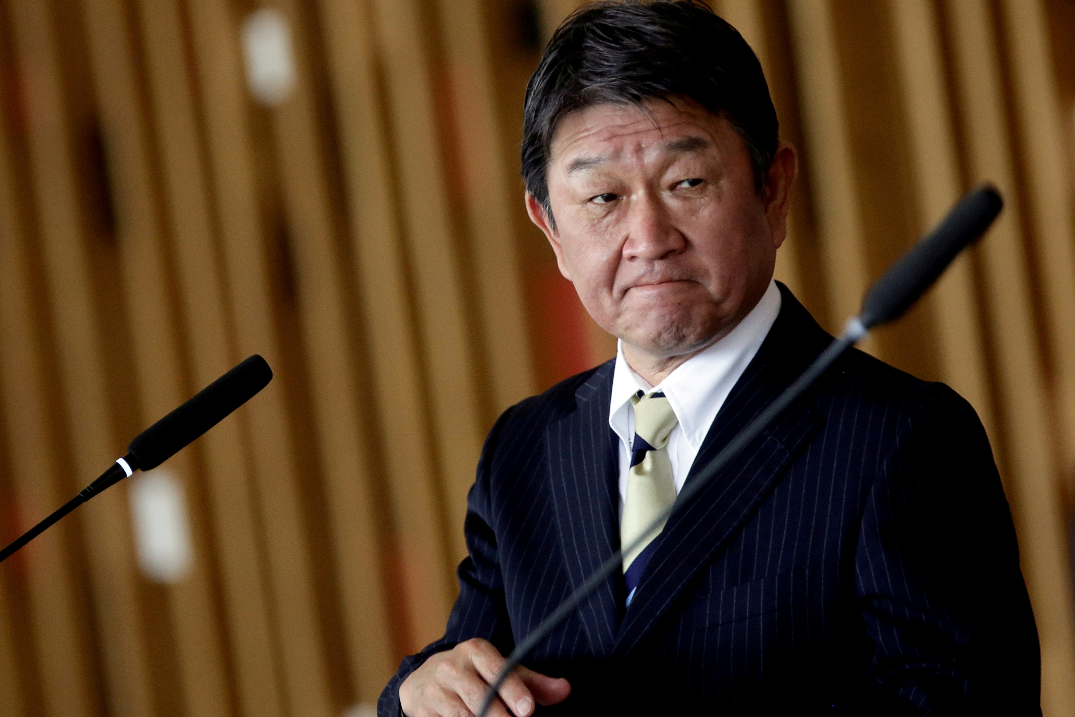 Japan's Foreign Minister Toshimitsu Motegi looks on during a statement to the media in Brasilia