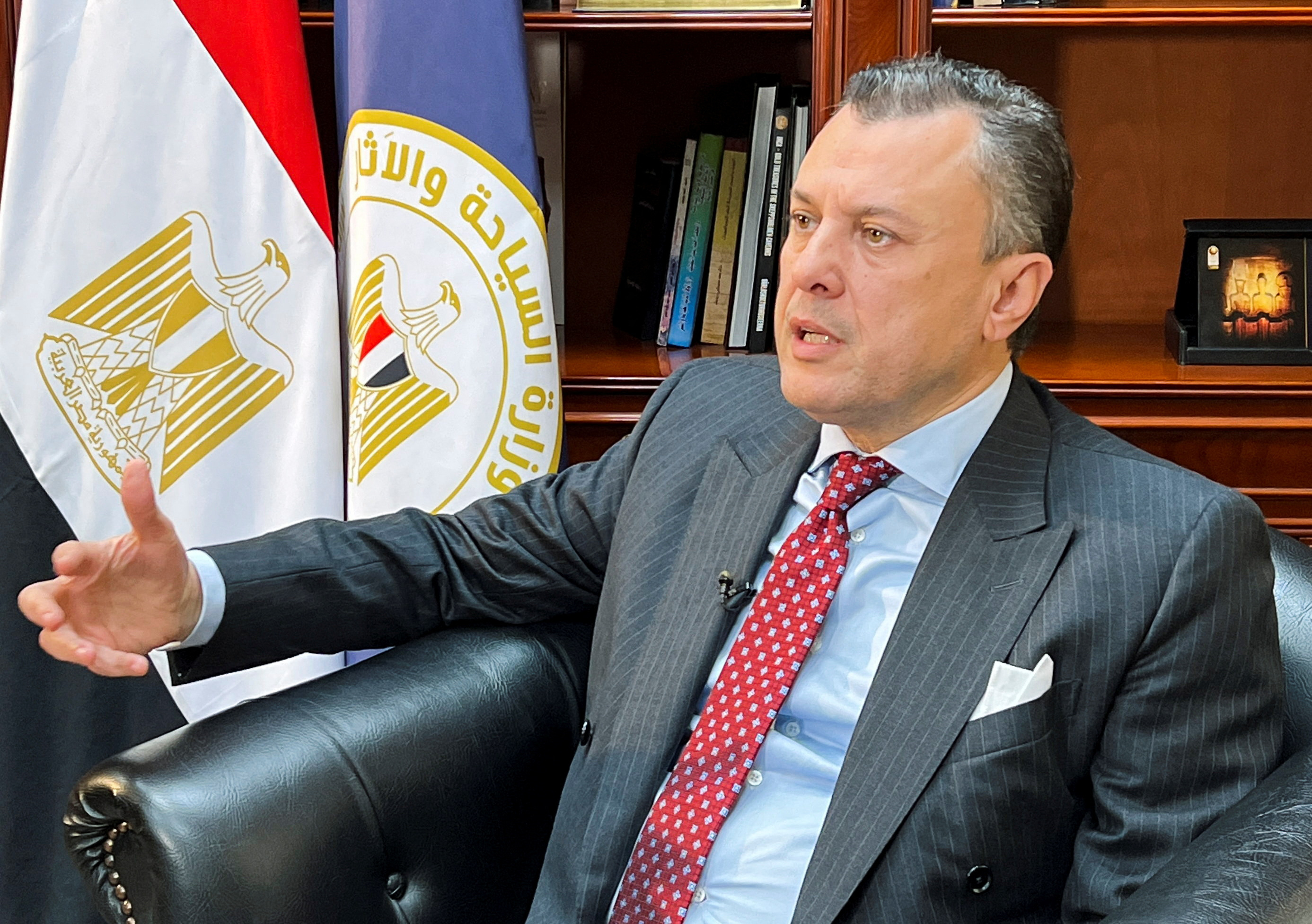 Egyptian Minister of Tourism and Antiquities Ahmed Issa speaks during an interview with Reuters at his office in Cairo