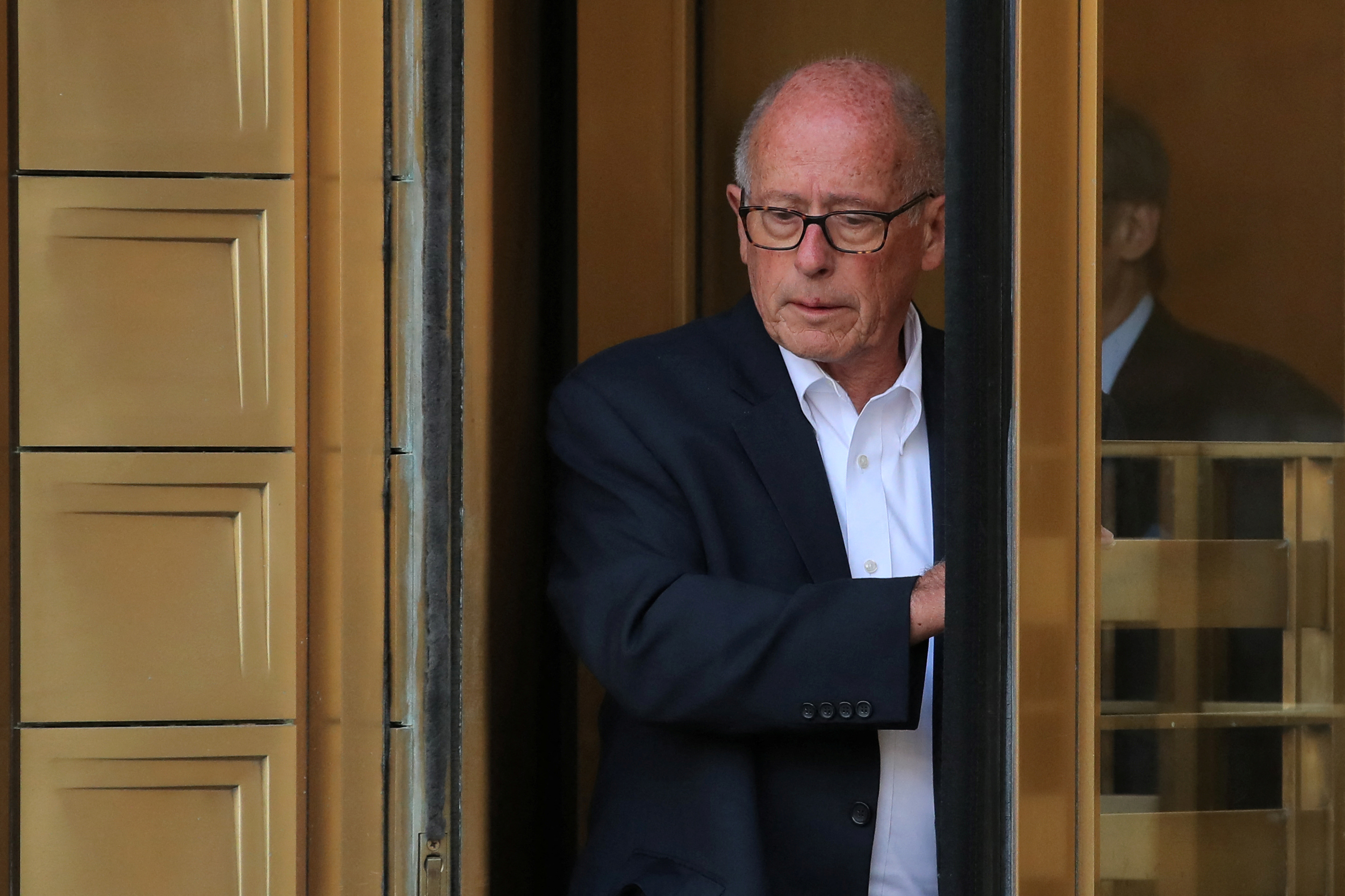 Laurence Doud III, former CEO of Rochester Drug Co-Operative, exits the Manhattan Federal Courthouse in New York