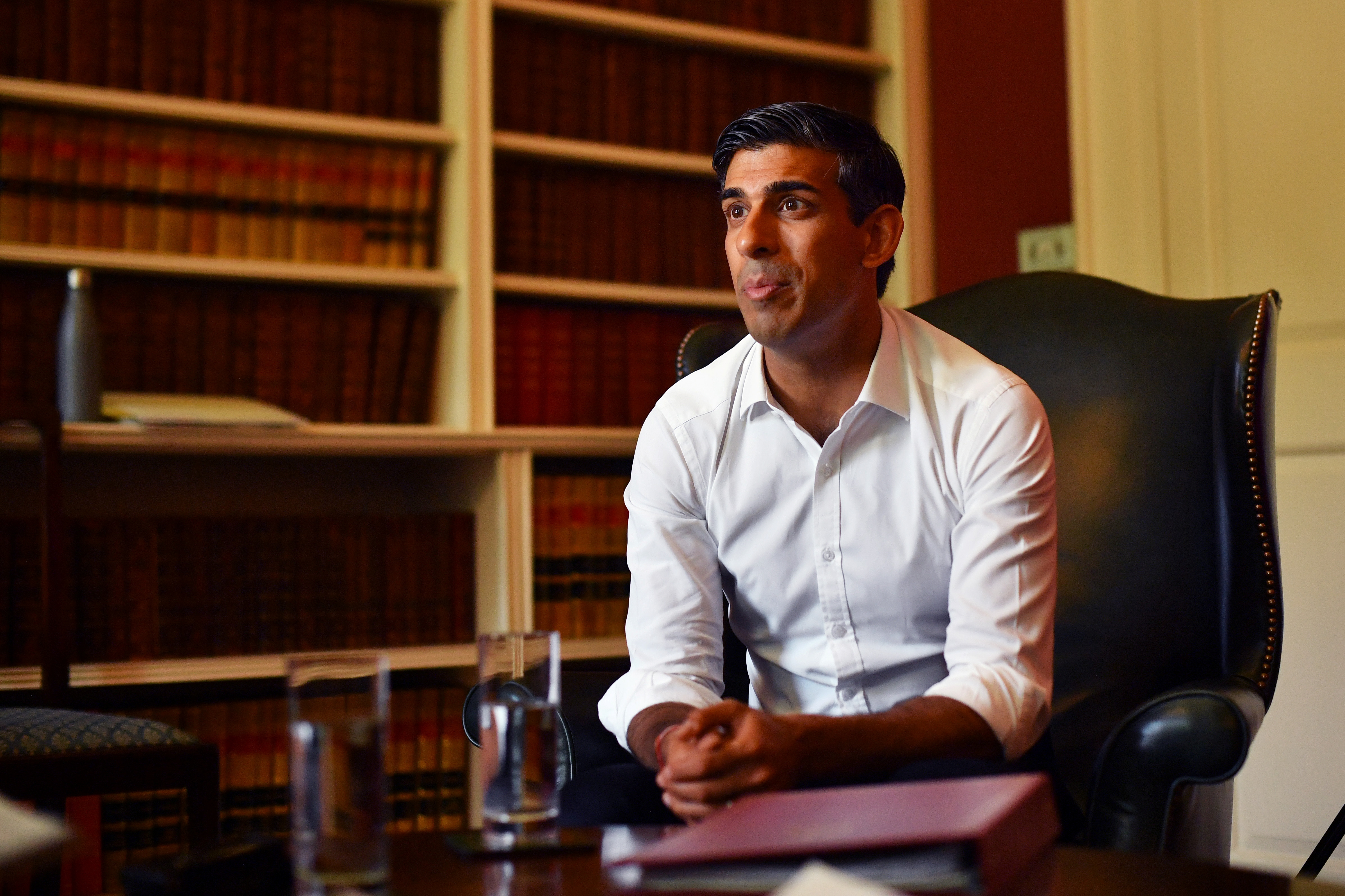 Britain's Chancellor of the Exchequer Rishi Sunak speaks during an interview in London