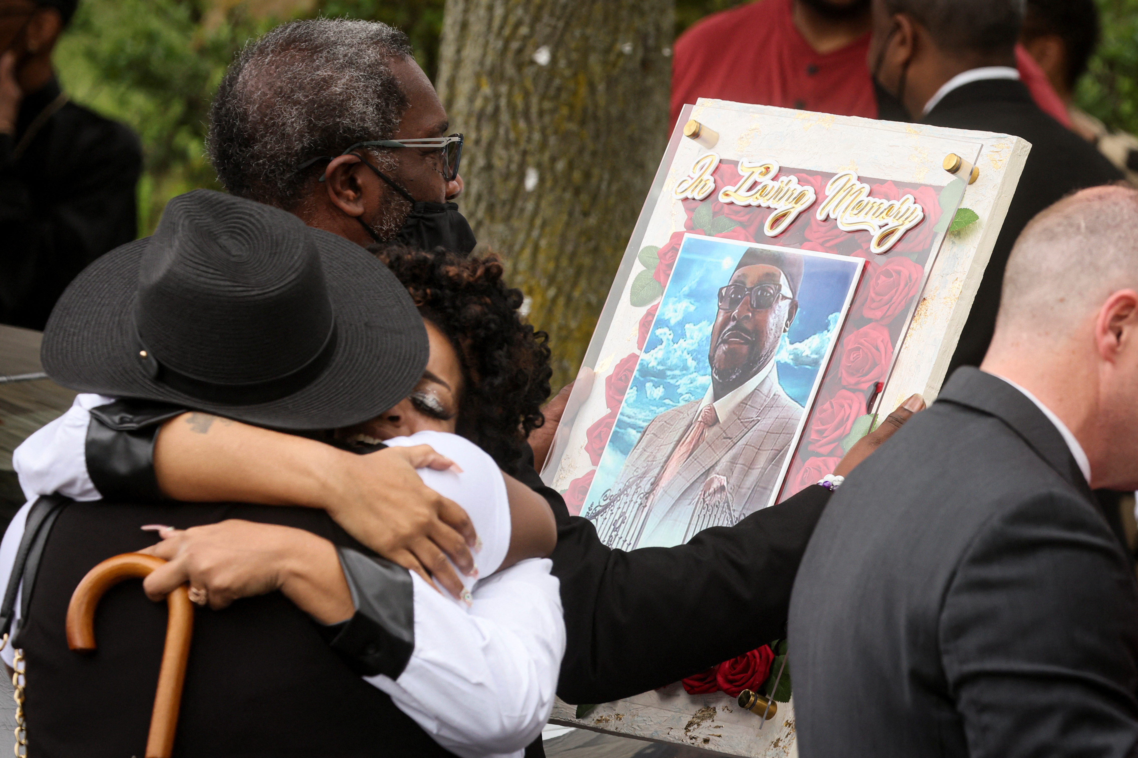 Mourners exit the funeral of Heyward Patterson in the wake of a weekend shooting at a Tops supermarket in Buffalo, New York