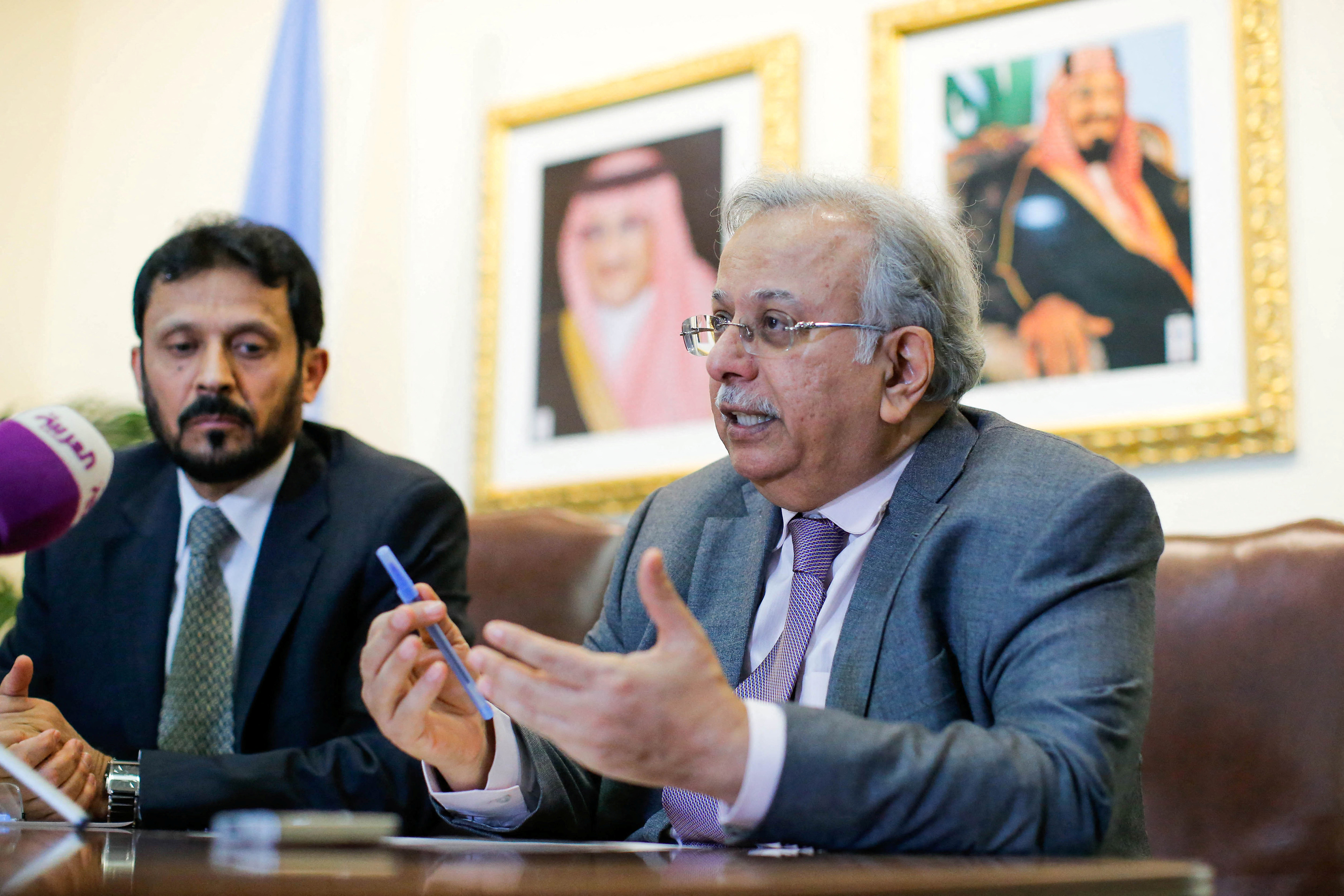 Saudi Arabia's Permanent Representative to the U.N Mouallimi speaks to the media next to Saudi general Ghanim during a news conference in New York