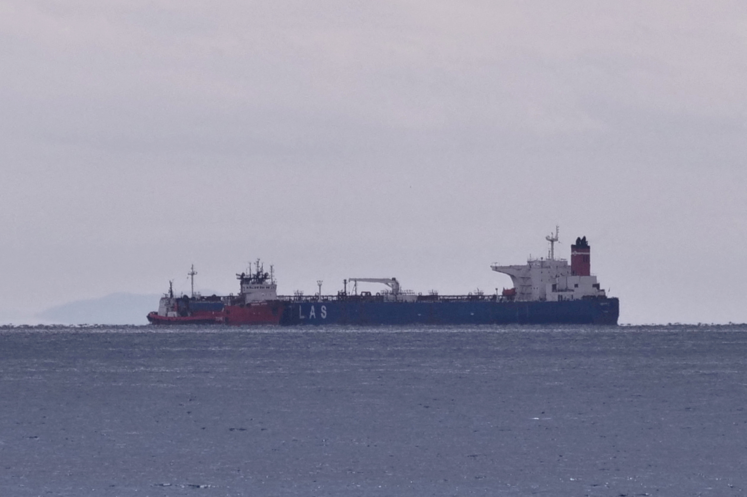 The seized oil tanker Pegas is seen anchored off the shore of Karystos, on the Island of Evia