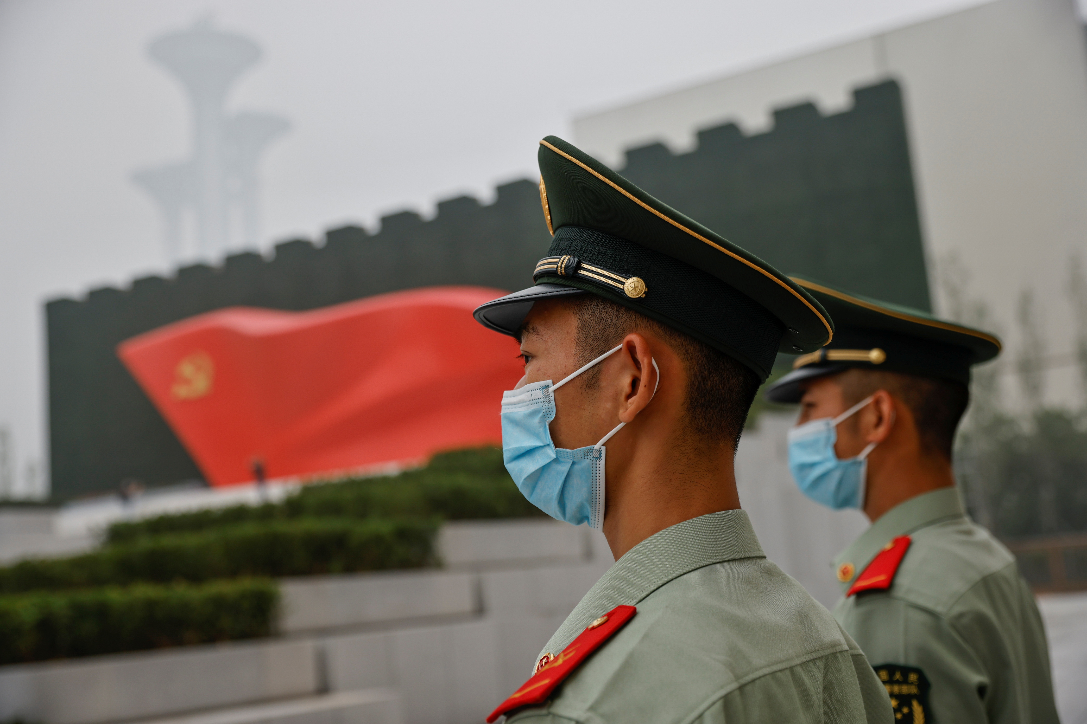 Officers of the People's Armed Police stand guard outside the Museum of the Communist Party of China that was opened ahead of the 100th founding anniversary of Party in Beijing