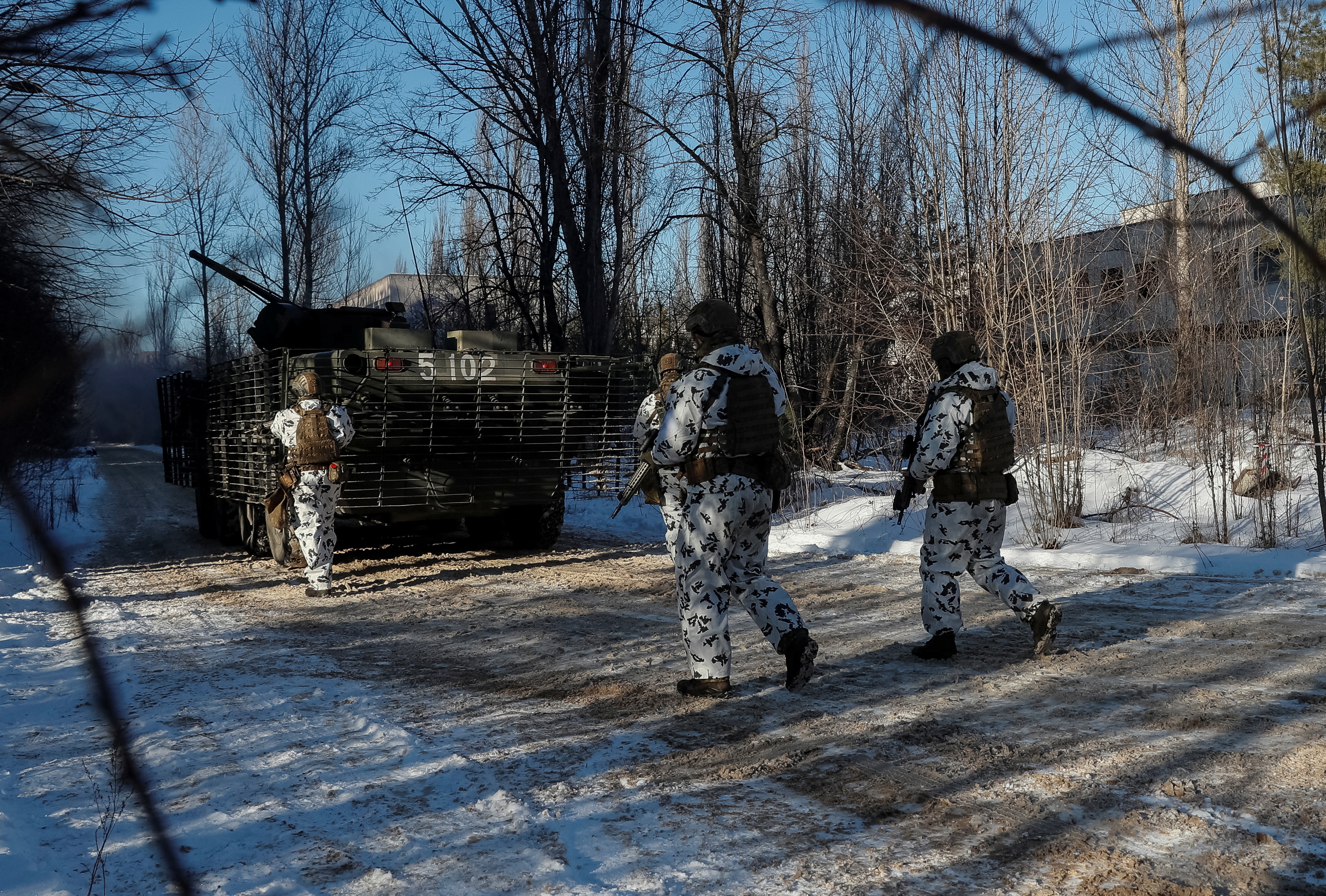Ukrainian soldiers drill urban warfare scenario in deserted Chernobyl town  | Reuters