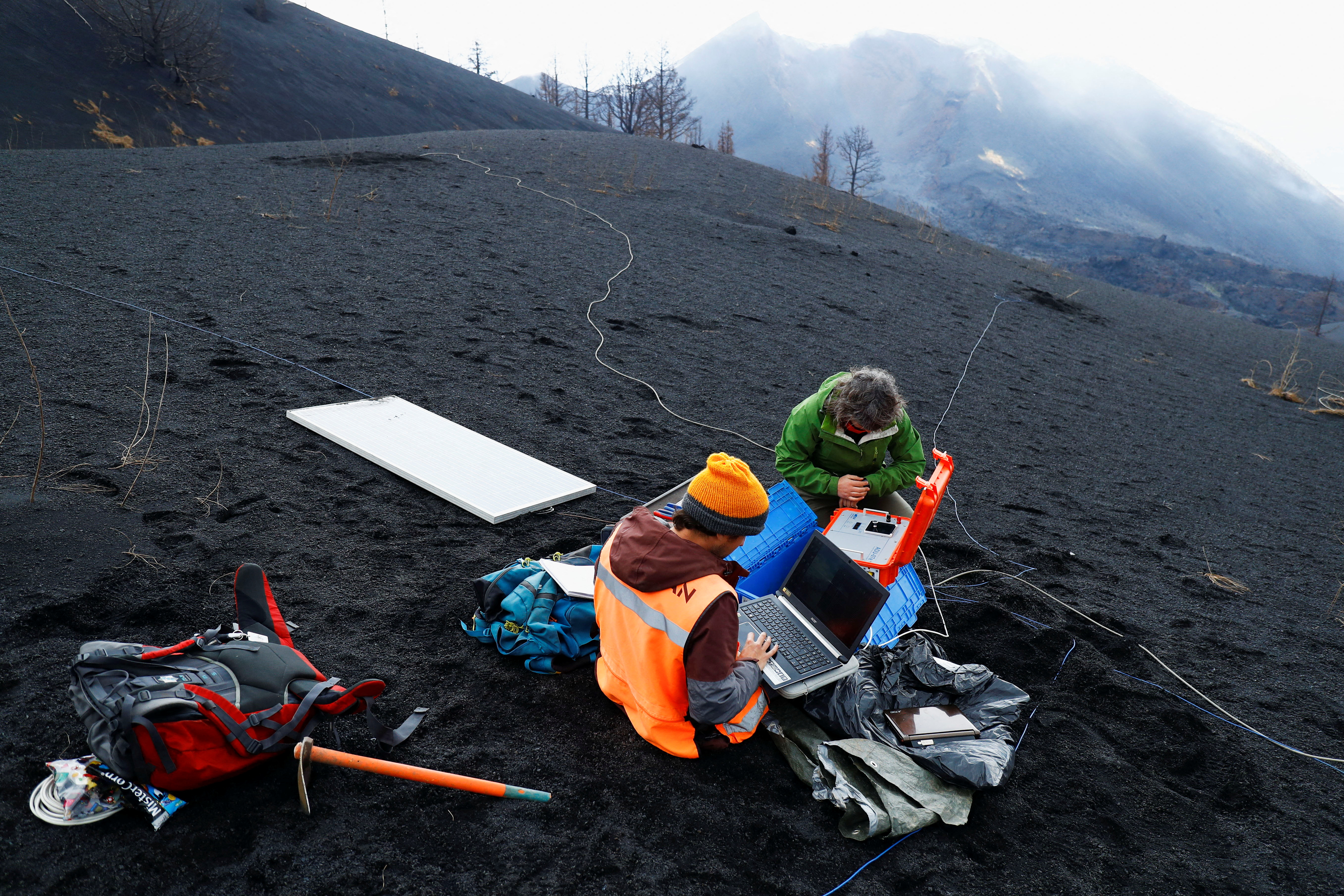 Members of INVOLCAN technical team visit crater of the Cumbre Vieja volcano, in La Palma
