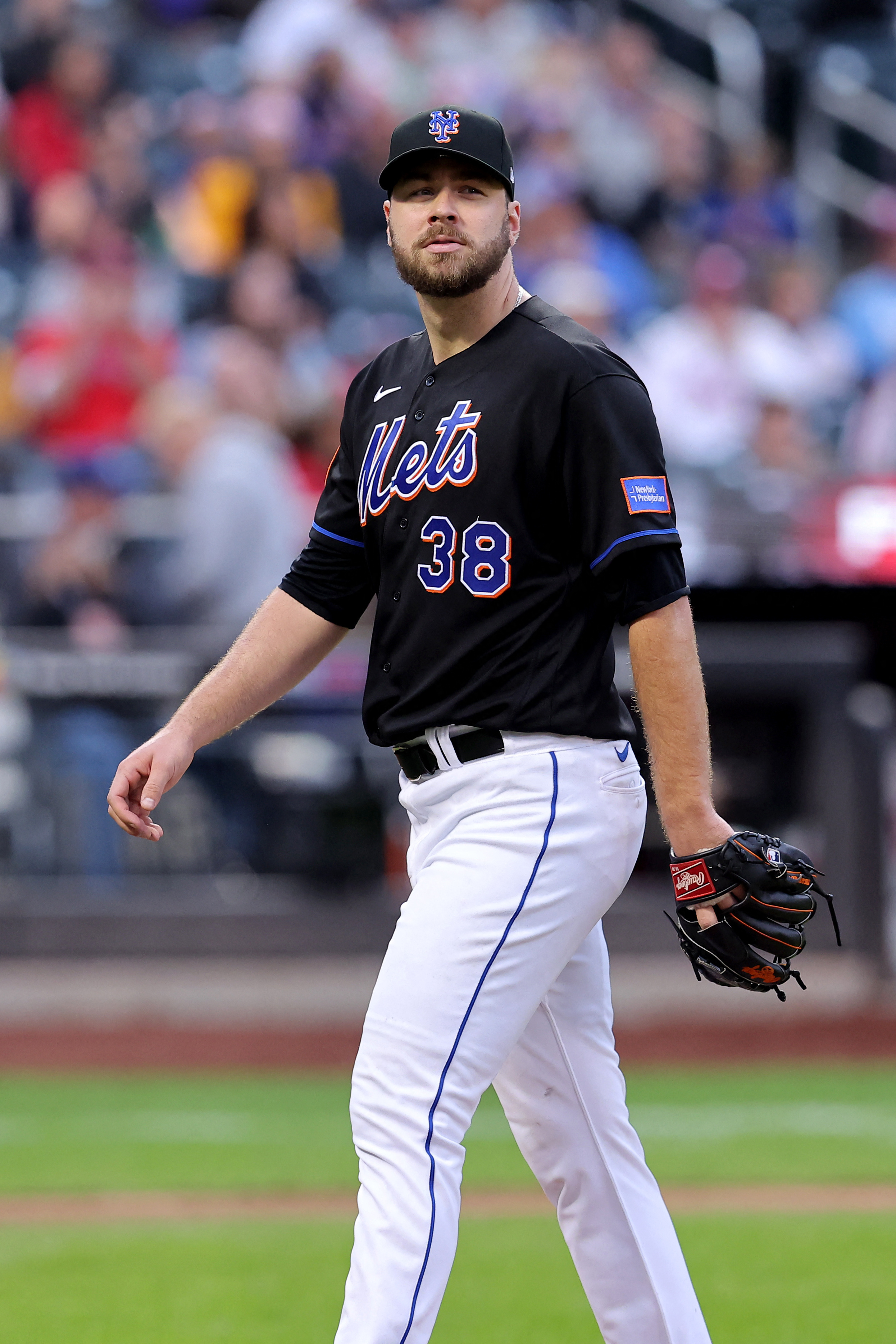 FLUSHING, NY - AUGUST 28: New York Mets Pitcher Tylor Megill (38) delivers  a pitch during the first inning of.a Major League Baseball game between the  Texas Rangers and the New York