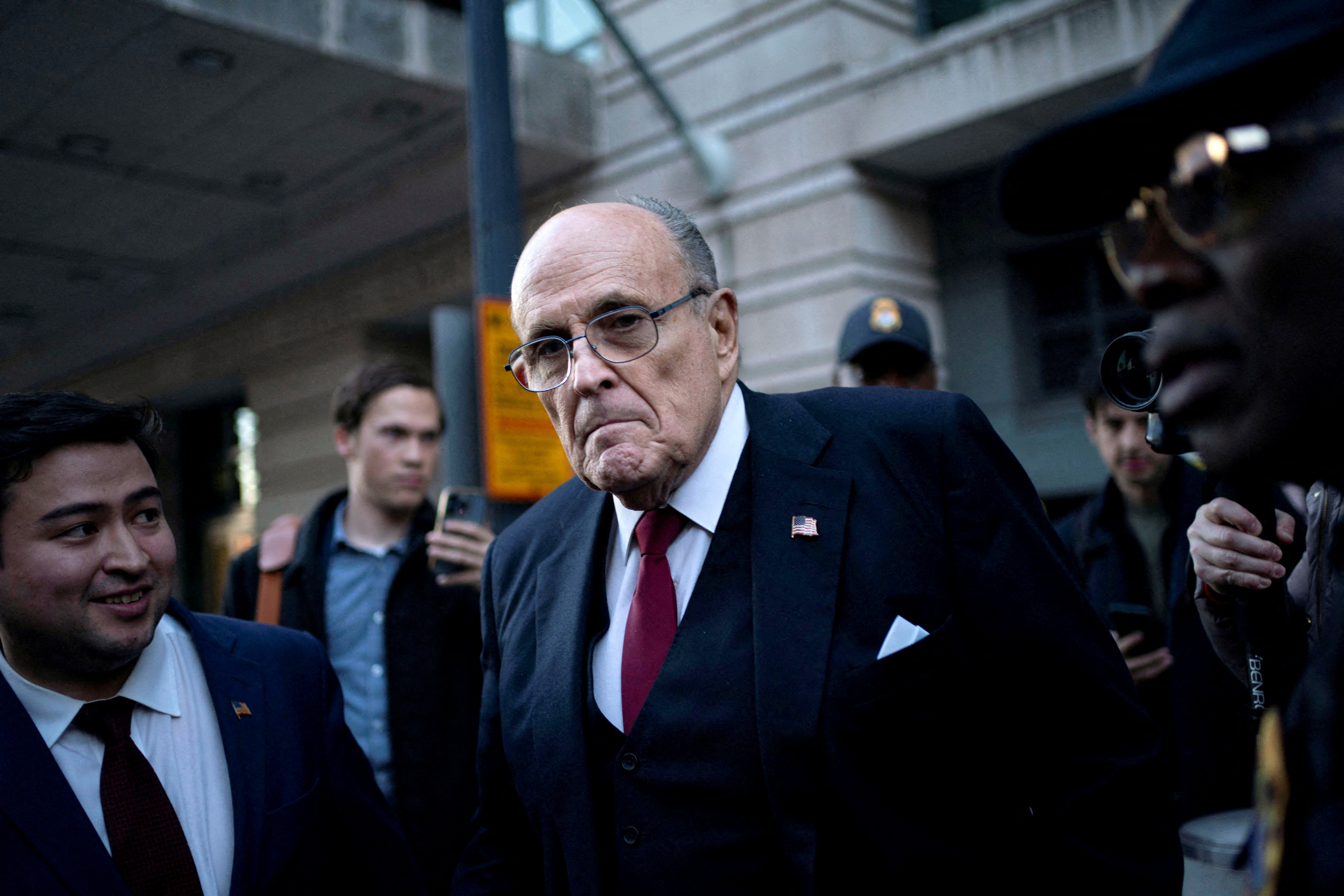 Former New York Mayor Rudy Giuliani departs defamation lawsuit at the District Courthouse in Washington