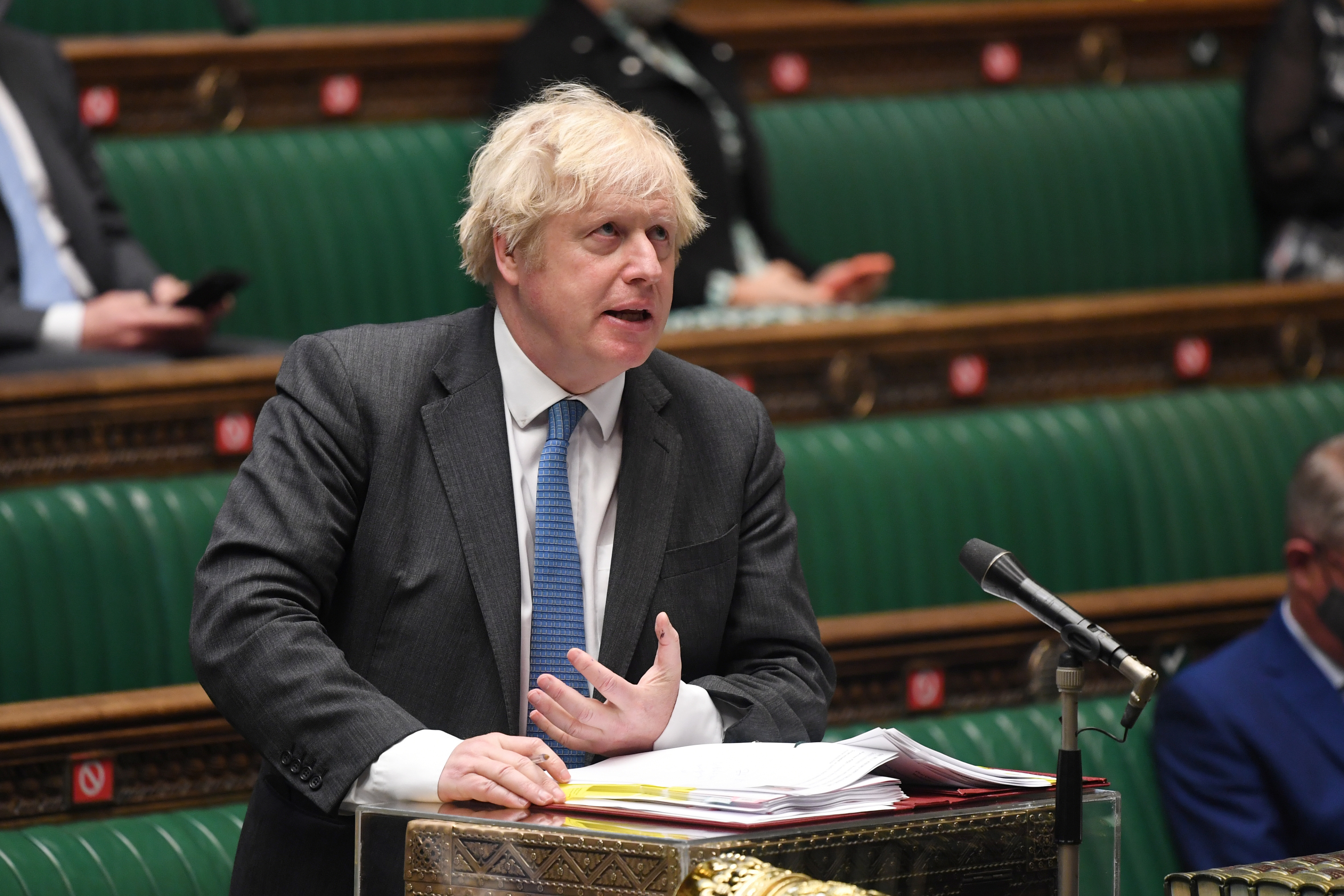 British Prime Minister Boris Johnson takes questions in Parliament, in London