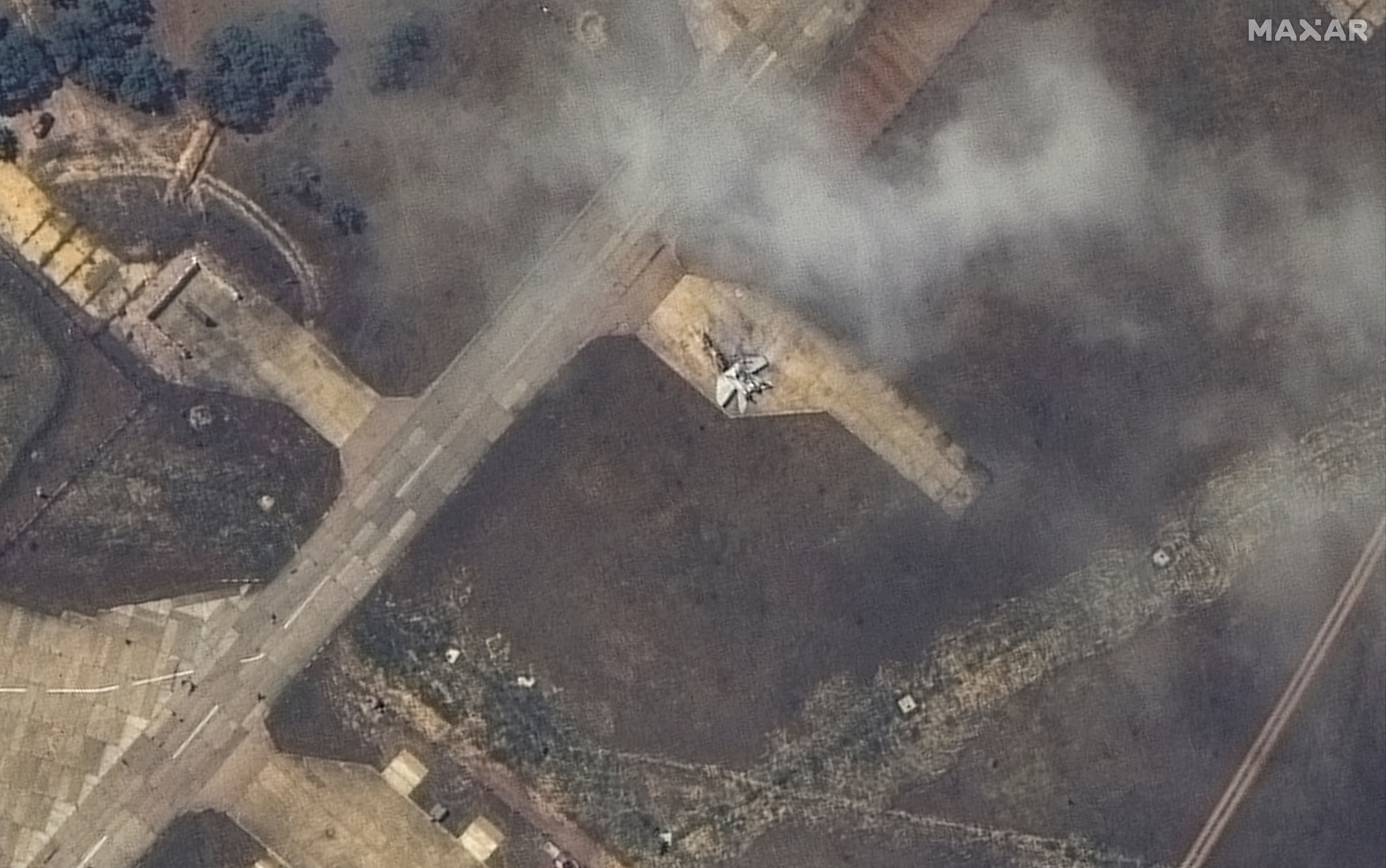 A satellite image shows what appears to be a damaged MiG29 fighter following an attack at Belbek Airbase, amid Russia's attack on Ukraine, in Crimea
