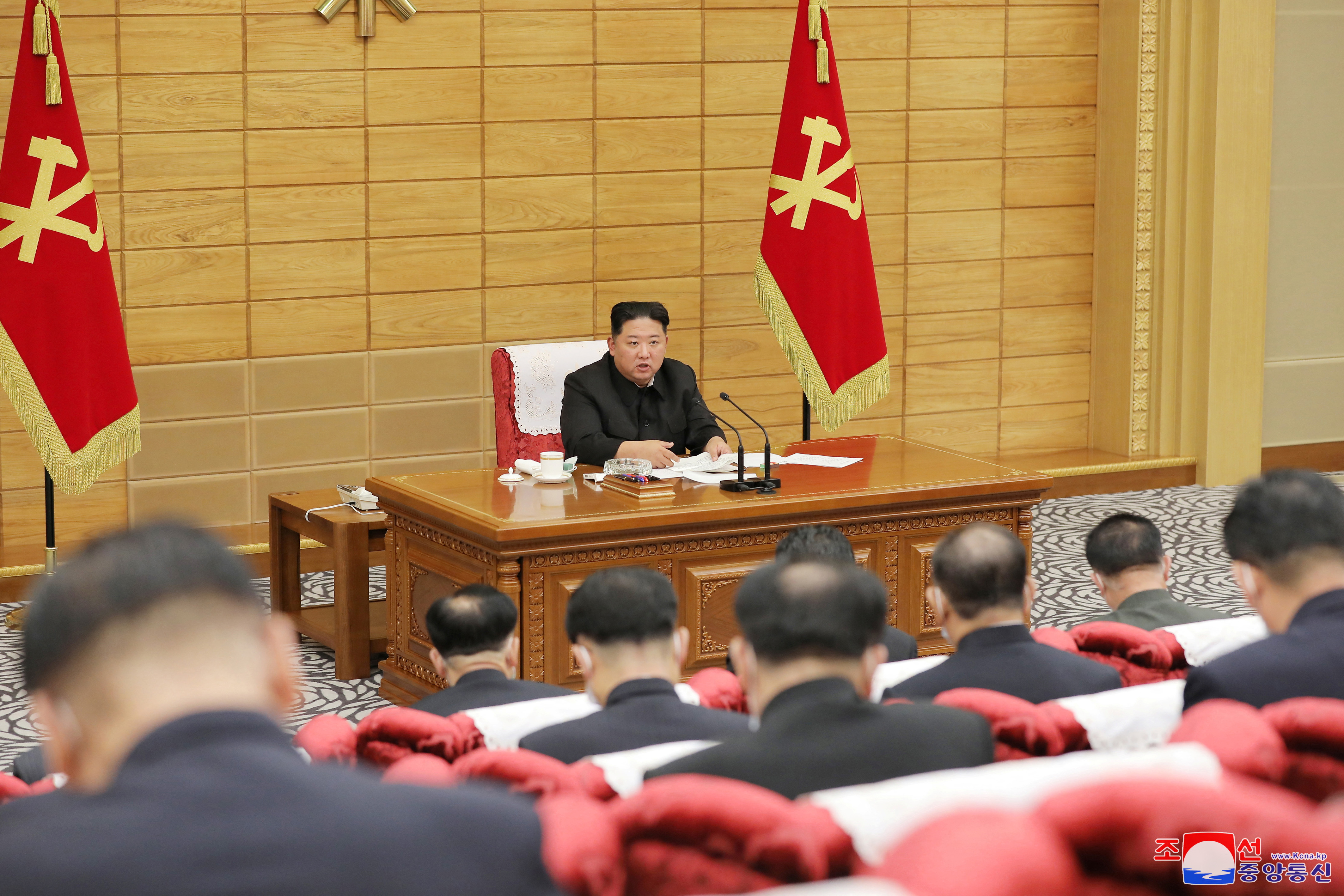 North Korean leader Kim Jong Un speaks at a politburo meeting of the ruling Workers' Party to inspect the country's antivirus efforts against the coronavirus disease (COVID-19) pandemic