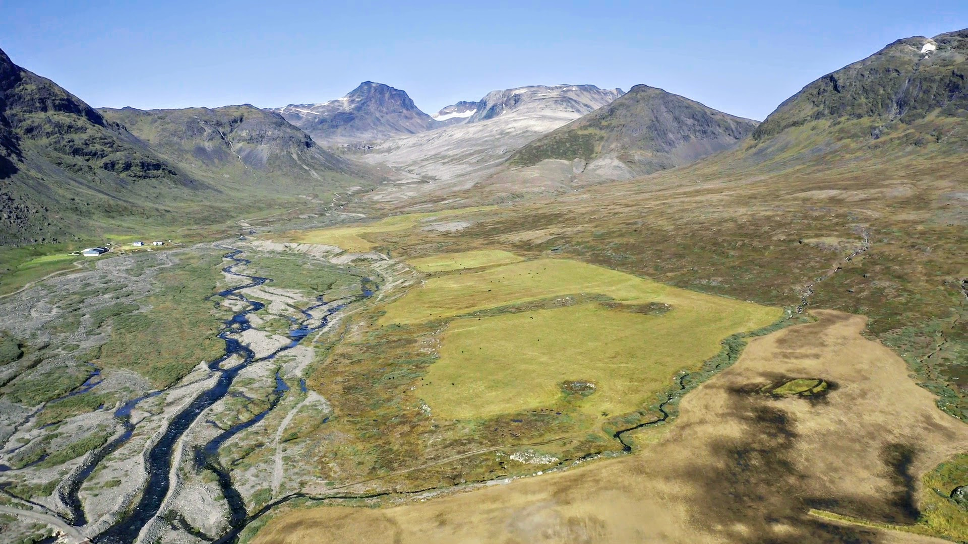 View of the Narsaq Valley in southern Greenland toward Kvanefjeld mountain, one of the worldÕs biggest deposits of rare earth elements and the site of a proposed mine planned to be developed by Australian-listed company Greenland Minerals, in this undated September 2020 handout photo. Greenland Minerals Ltd/Handout via REUTERS/File Photo