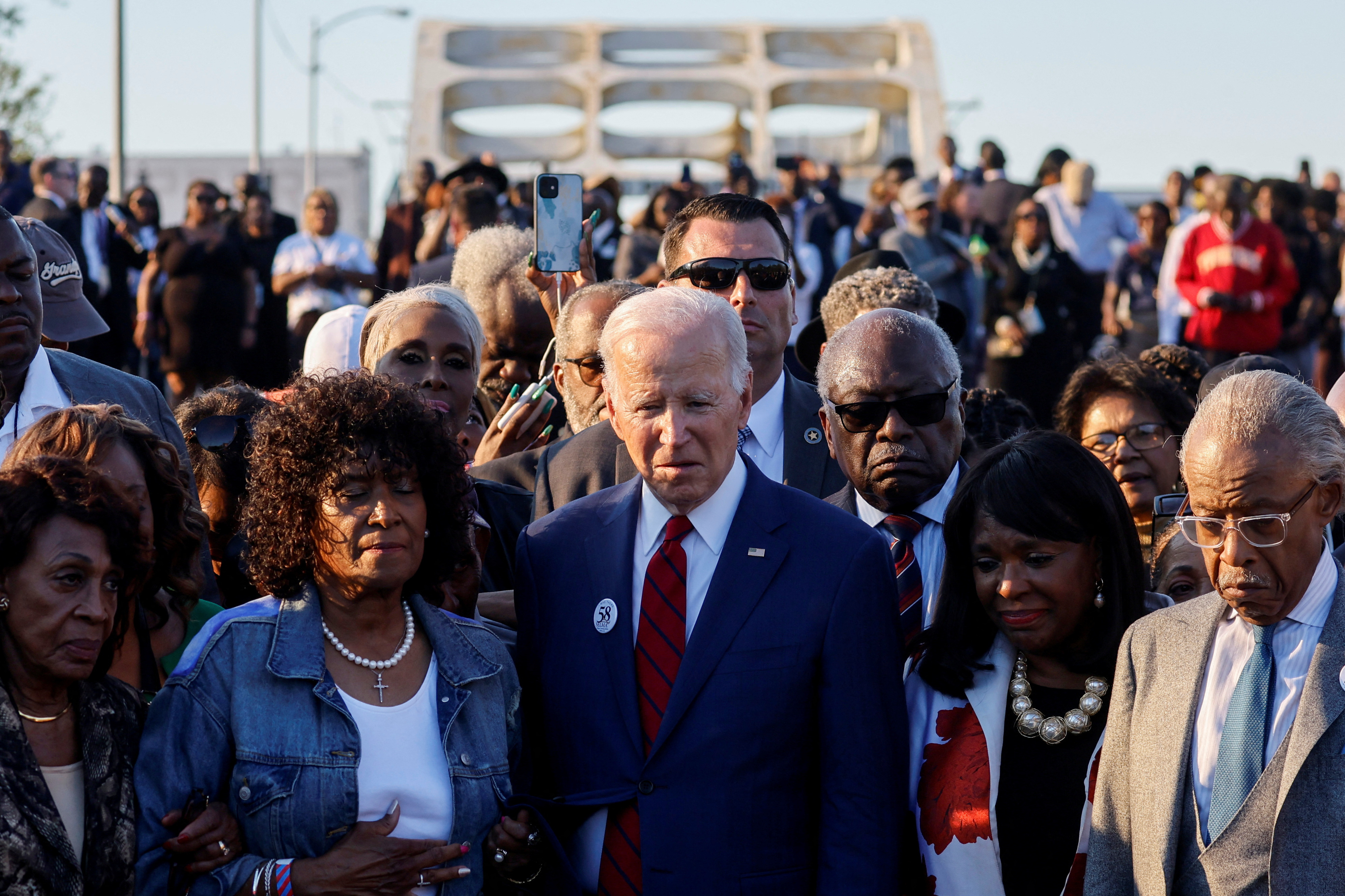 U.S. President Biden participates in a commemorative civil rights march across the Edmund Pettus Bridge in Selma, Alabama
