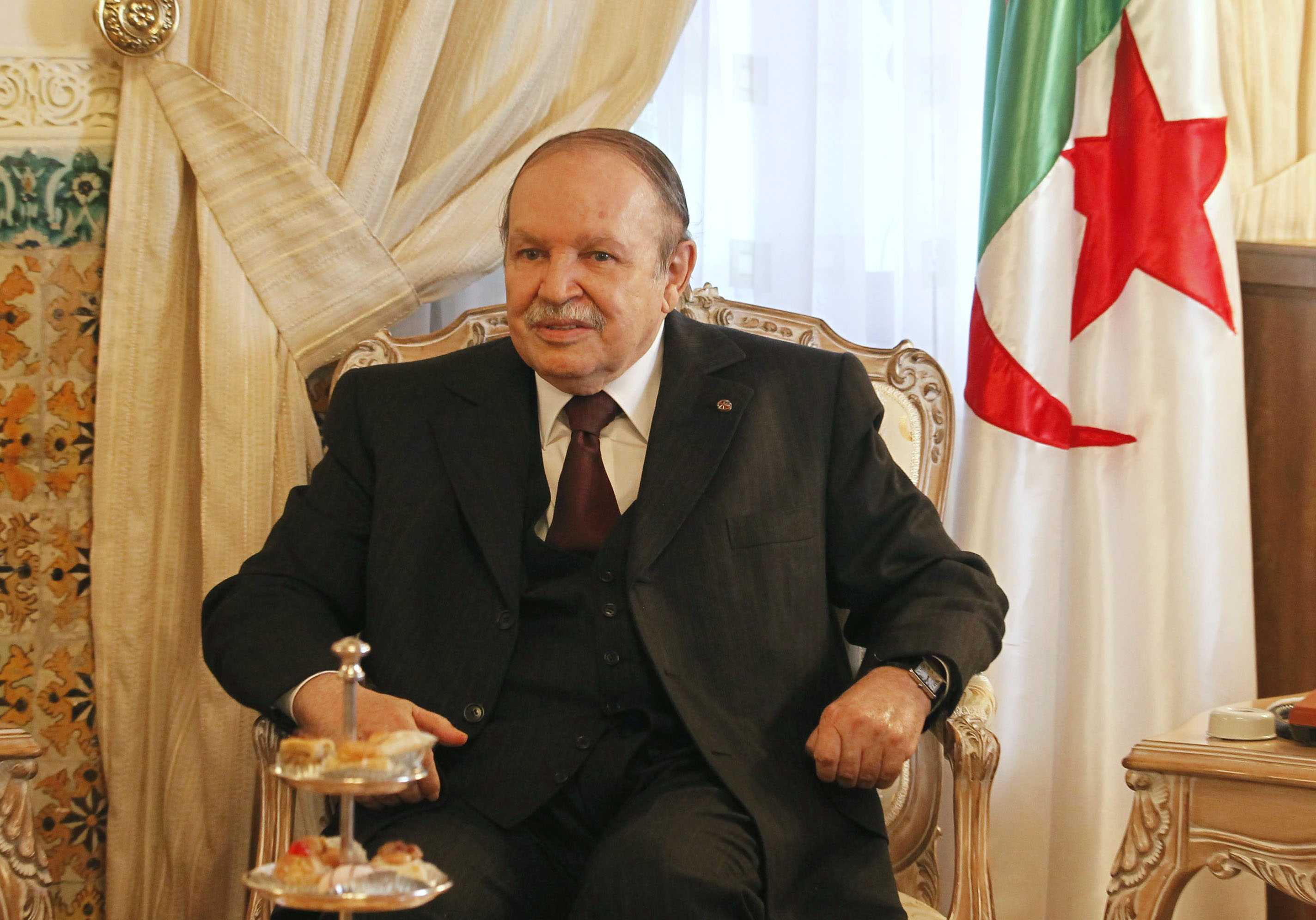 Algeria's President Abdelaziz Bouteflika speaks with Qatar's Prime Minister Sheikh Hamad bin Jassim al-Thani (not pictured) during their meeting at the Presidential Palace in Algiers September 11, 2012. REUTERS/Louafi Larbi /File Photo