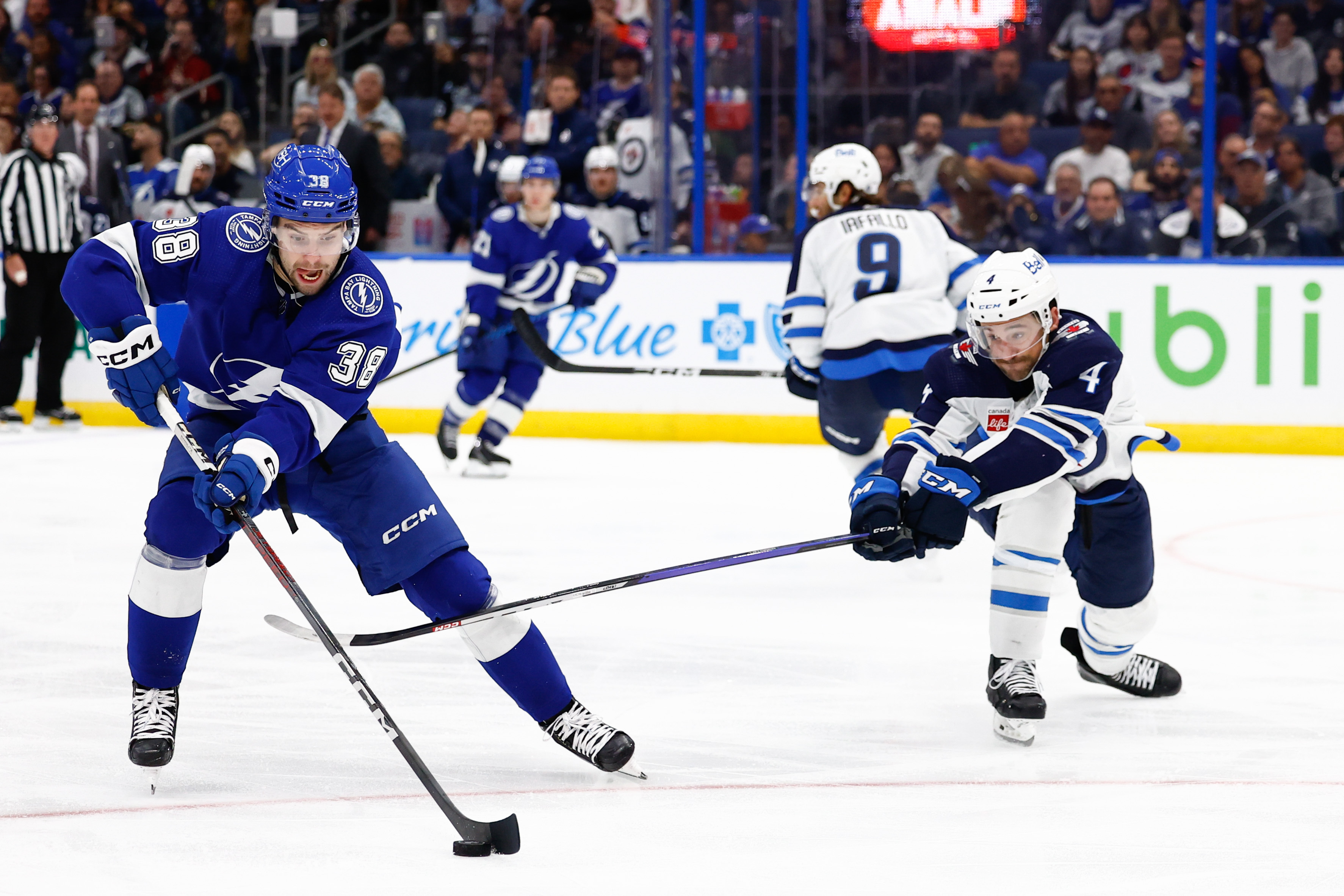 Adam Lowry Leads Jets Past Lightning In Overtime 