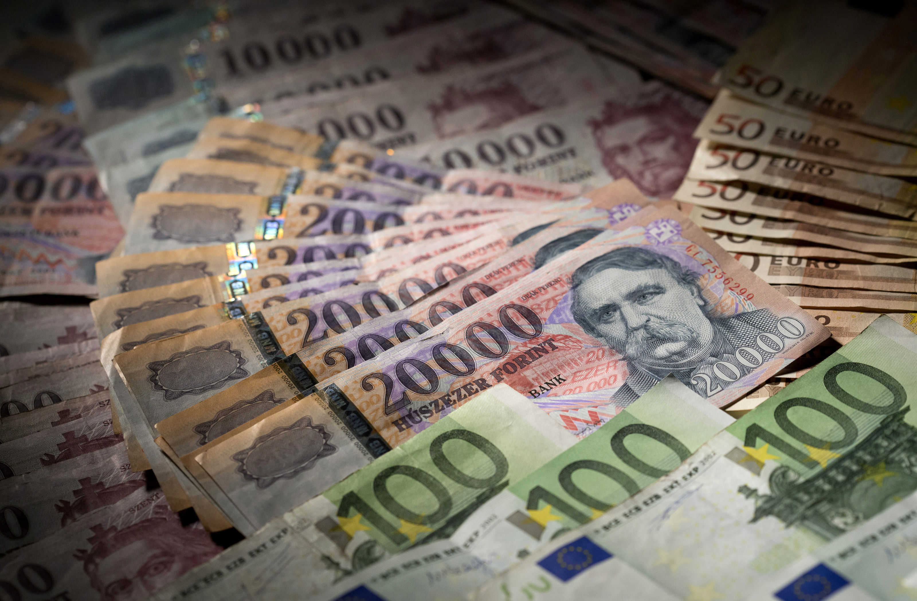 Hungarian forints and Euro notes are seen in this photo illustration taken in Budapest