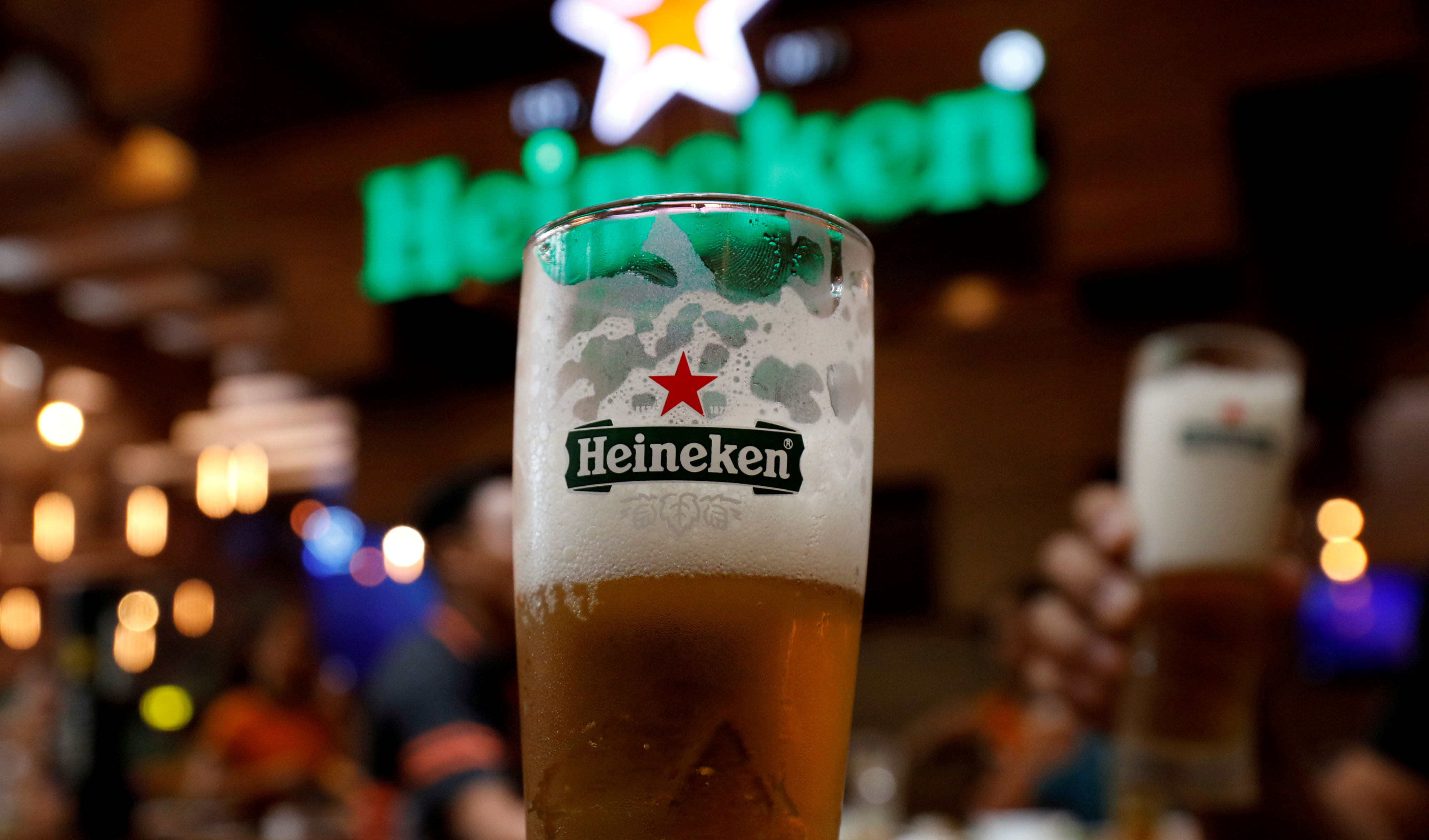 Glasses of Heineken beer are seen at a restaurant in Hanoi