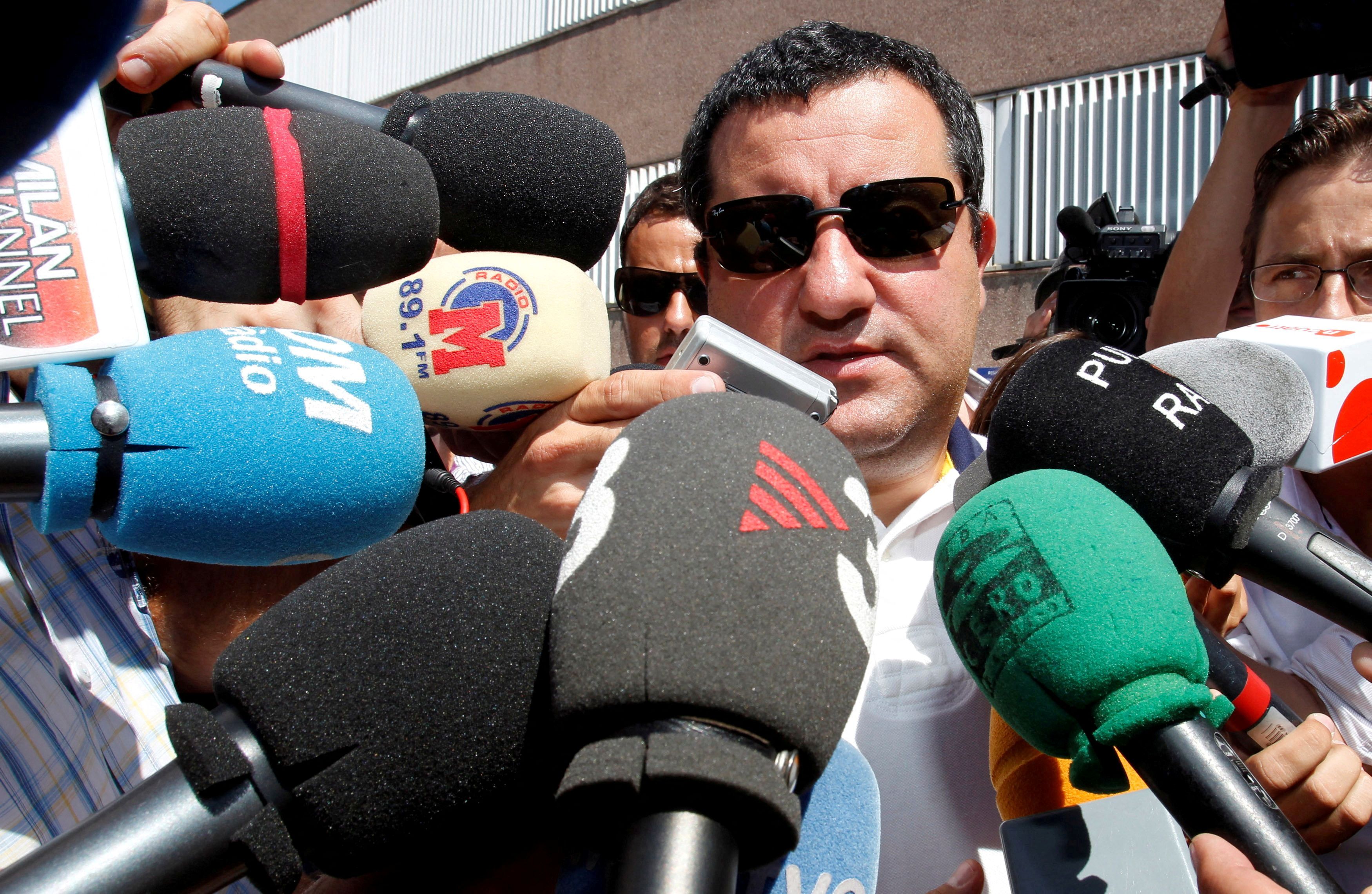 Soccer agent Mino Raiola speaks to the media as he arrives at FC Barcelona's office in Barcelona