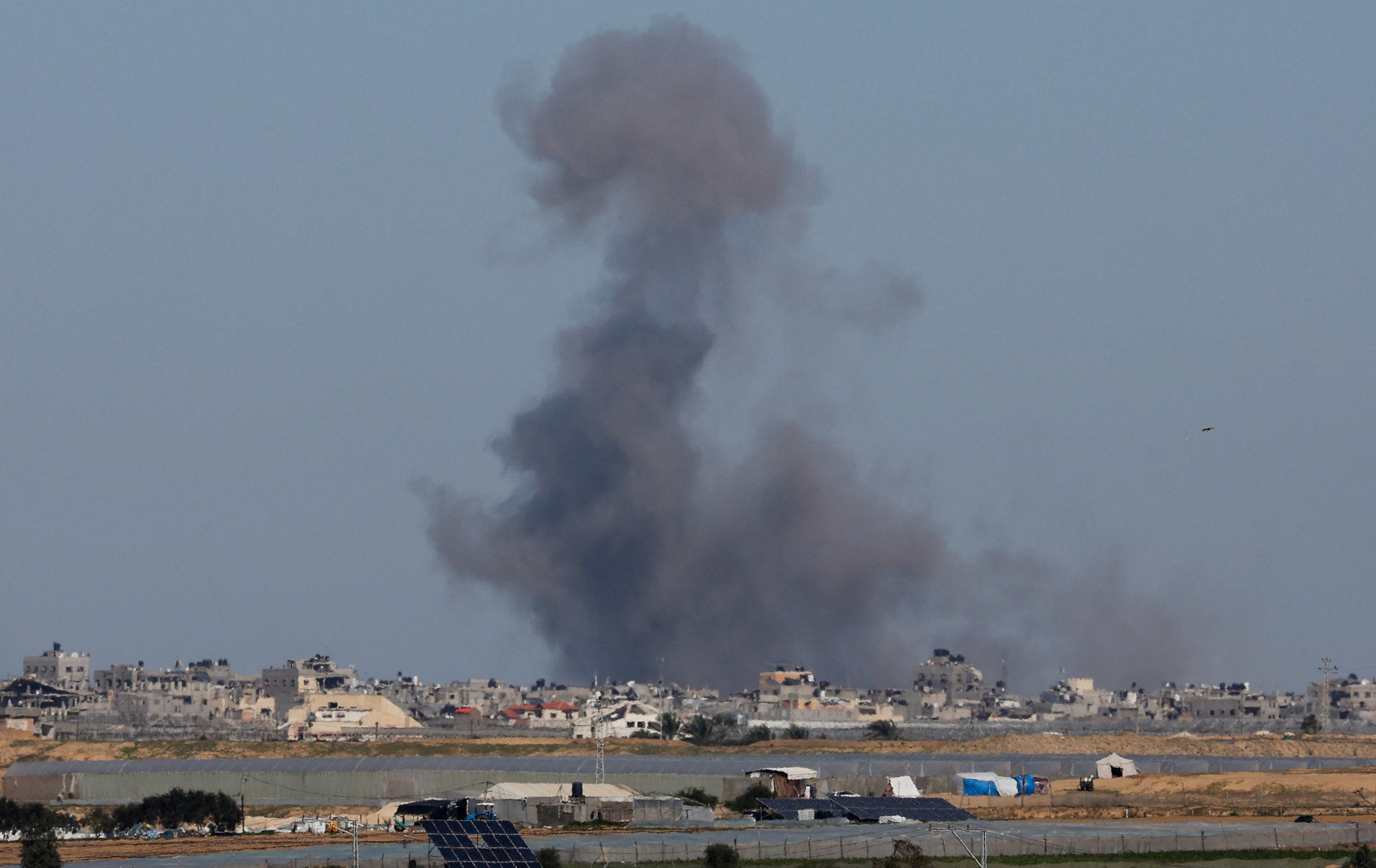 Smoke rises during an Israeli ground operation in Khan Younis, as seen from Rafah
