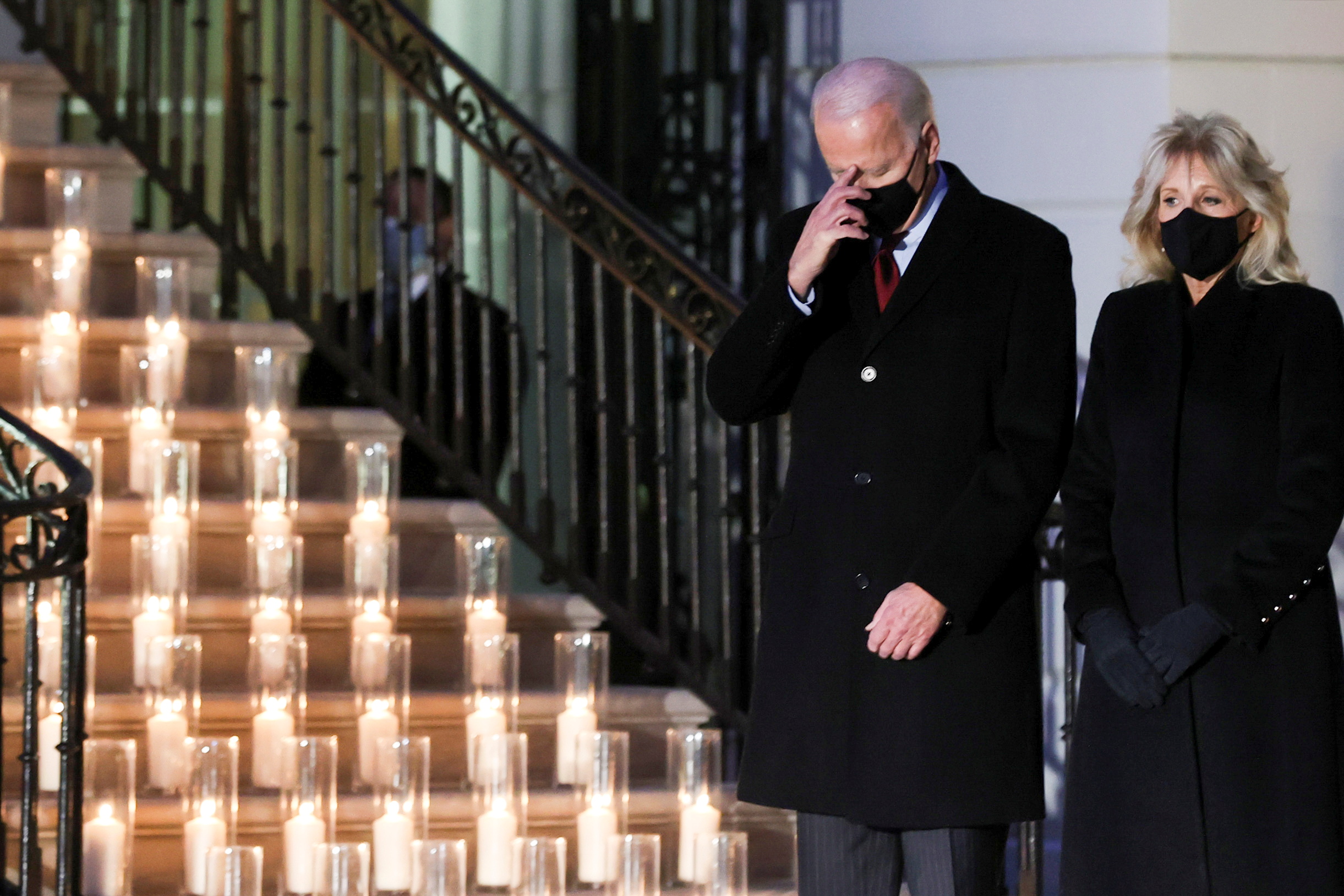 U.S. President Joe Biden commemorates the grim milestone of 500,000 U.S. deaths from the coronavirus disease (COVID-19) during a moment of silence and candle lighting ceremony at the White House in Washington