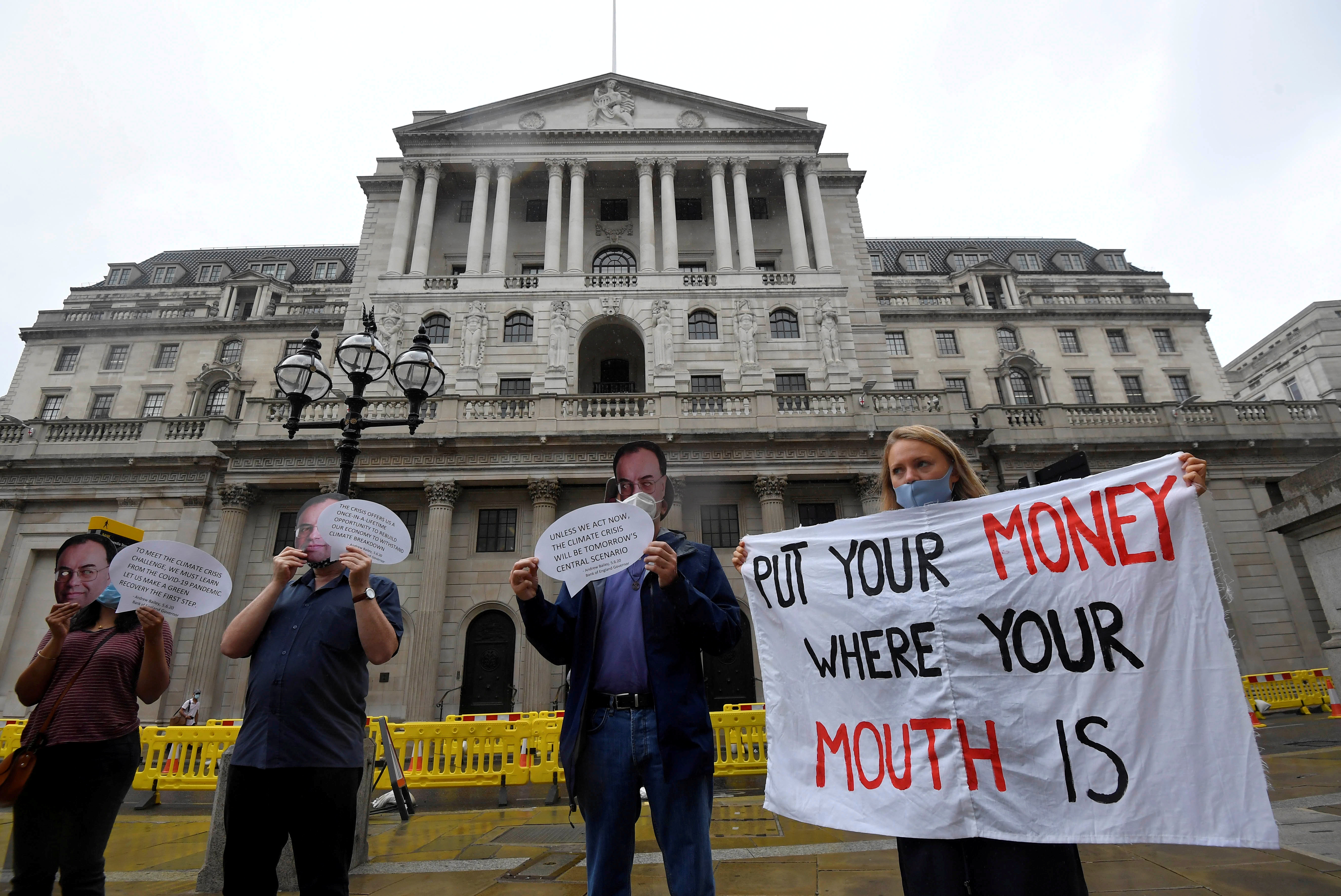Environmental protest to encourage a green economy, outside of the Bank of England in the City of London, Britain