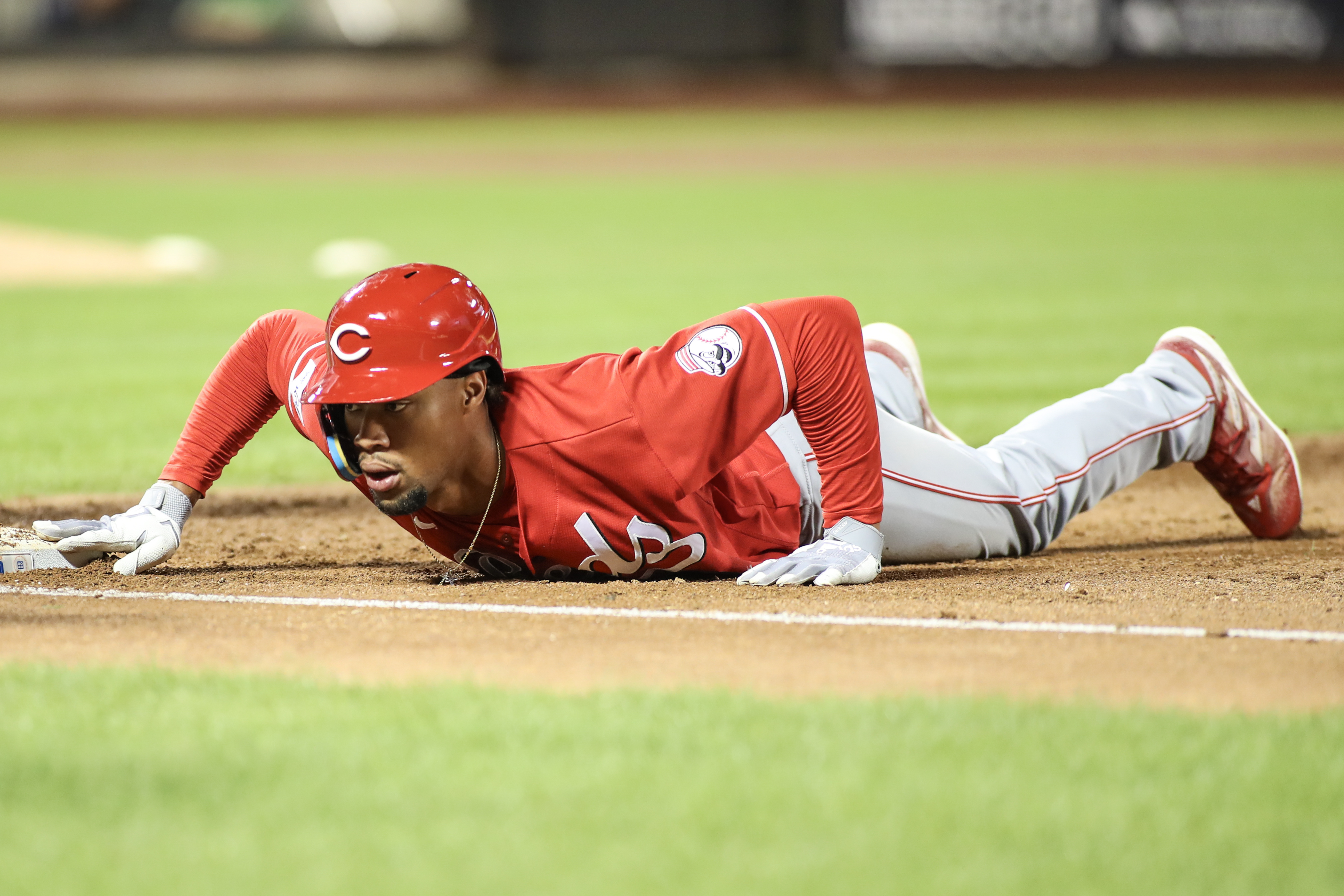 Reds beat Mets 5-3, keep pace in wild-card race