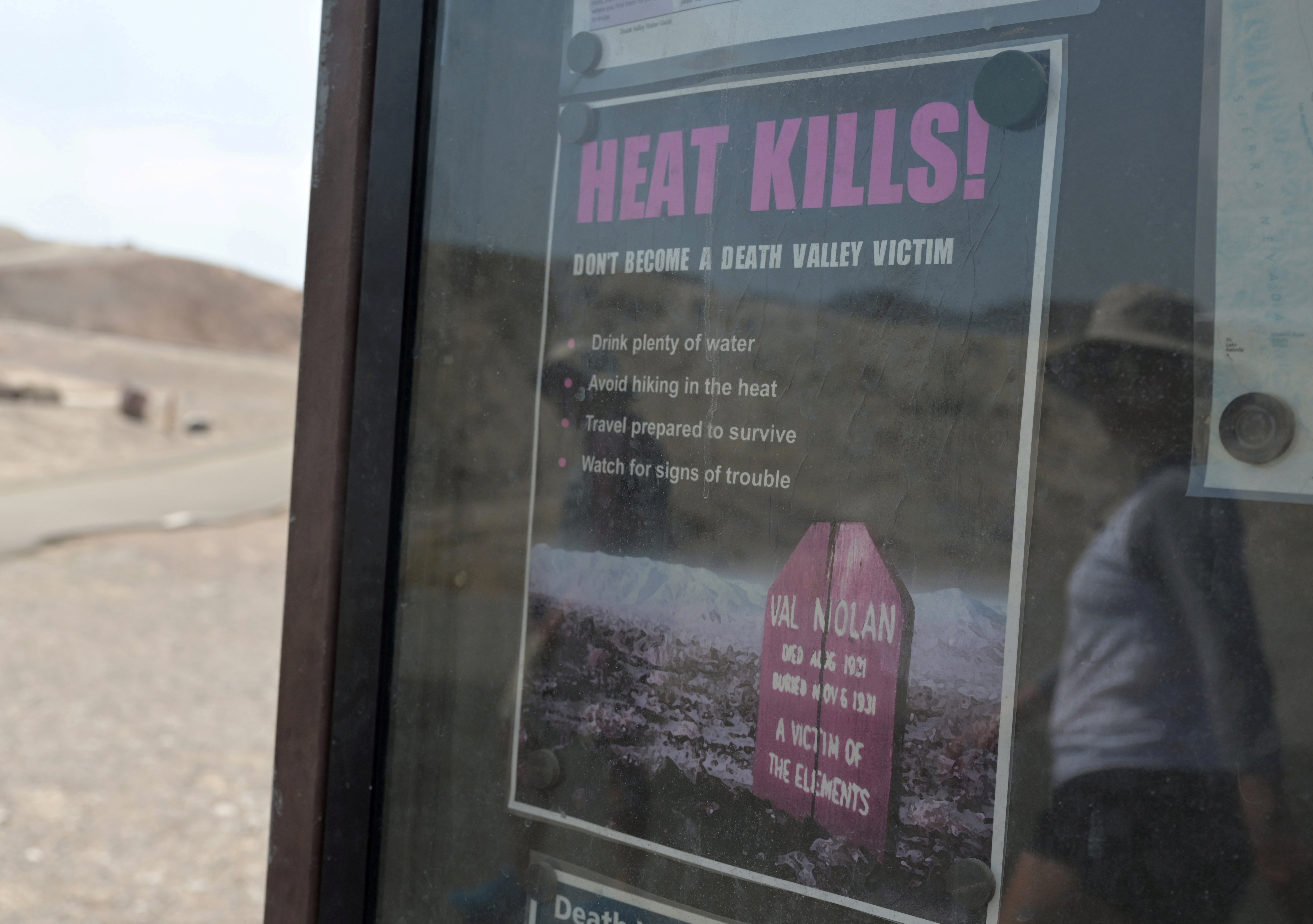 A sign reads “heat kills” in Death Valley