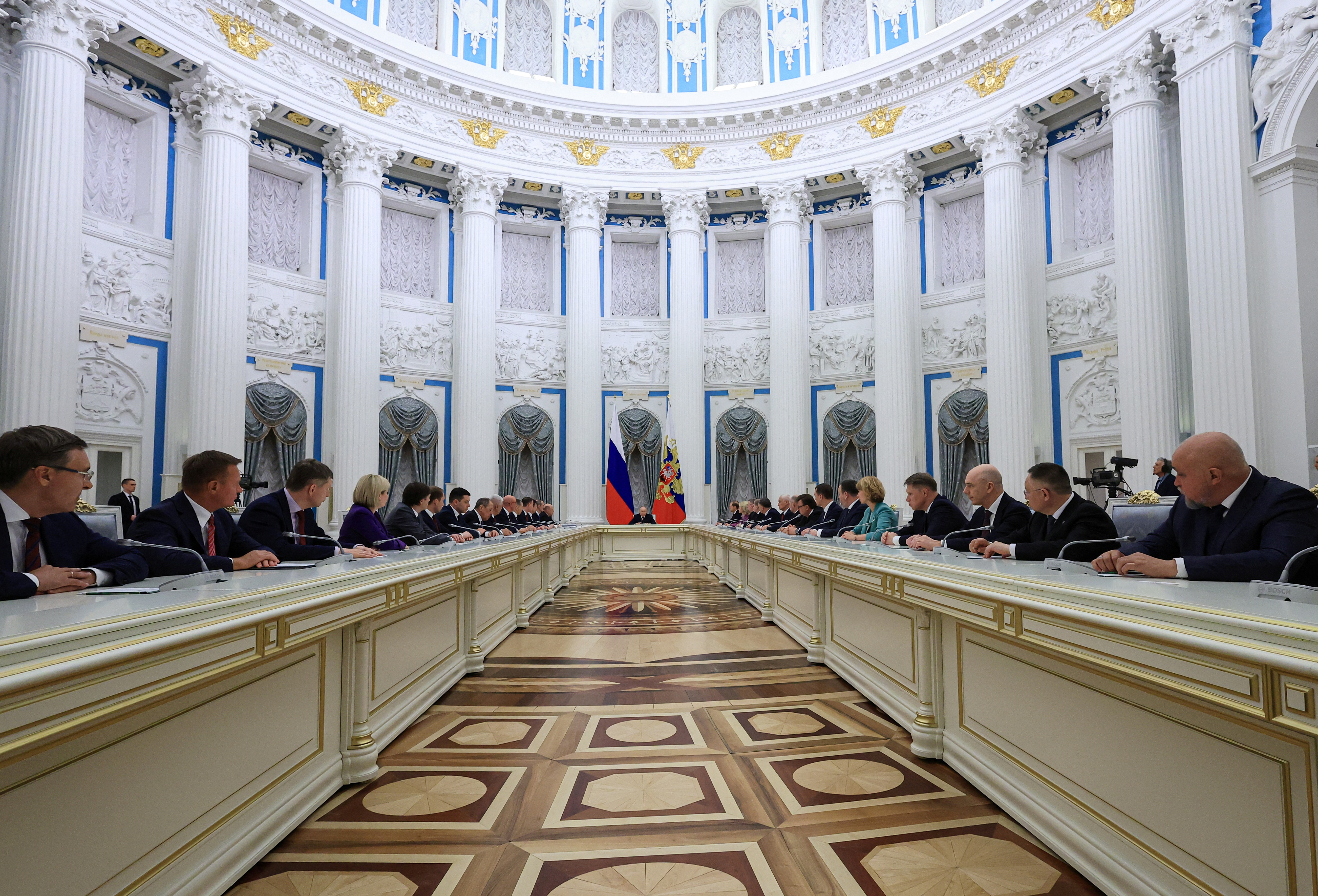 Russian President Putin chairs a meeting with members of the new government in Moscow