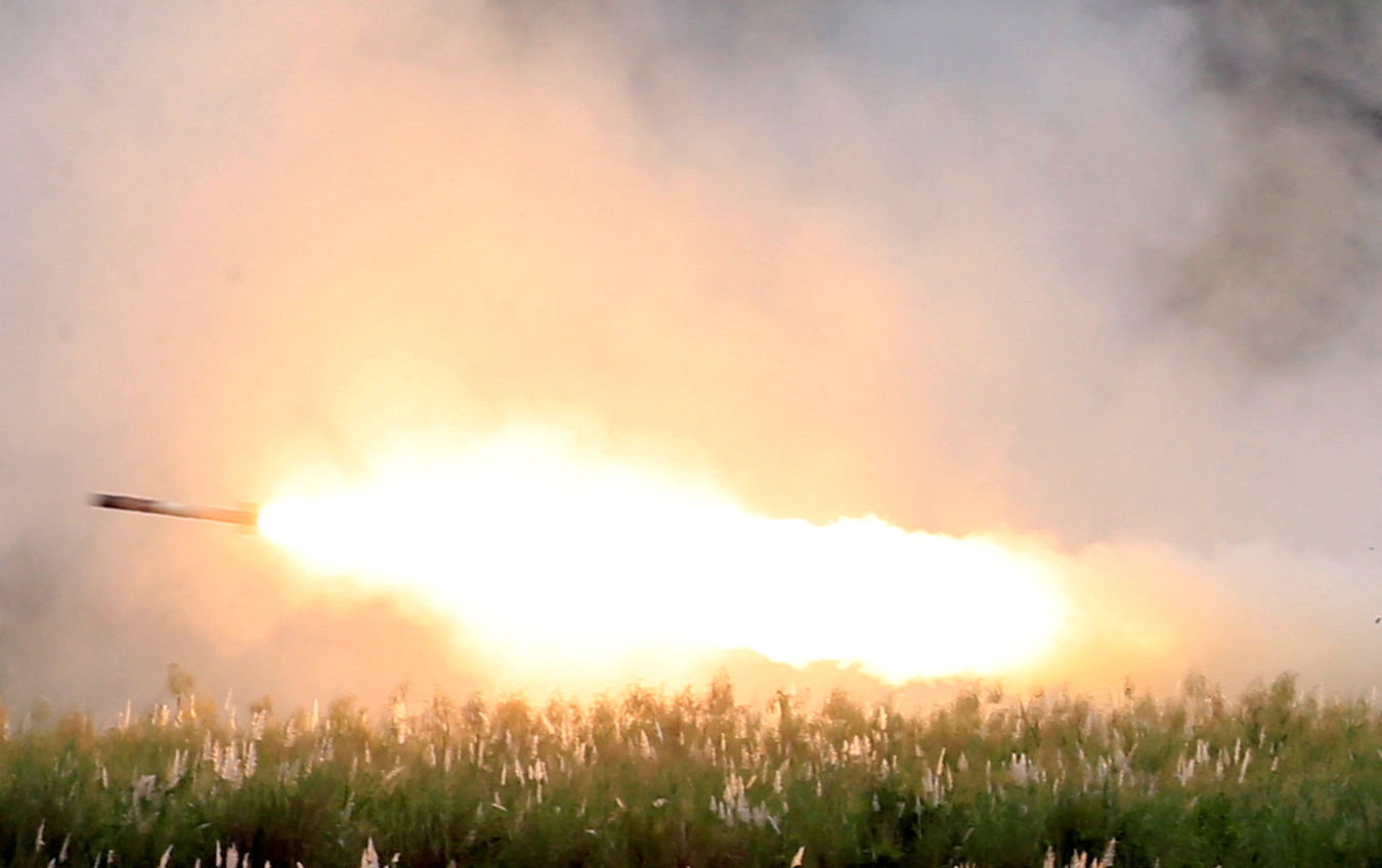 U.S. military forces fire a High Mobility Artillery Rocket System (HIMARS) rocket during the annual  Philippines-US live fire amphibious landing exercise (PHIBLEX) at Crow Valley in Capas, Tarlac province, north of Manila