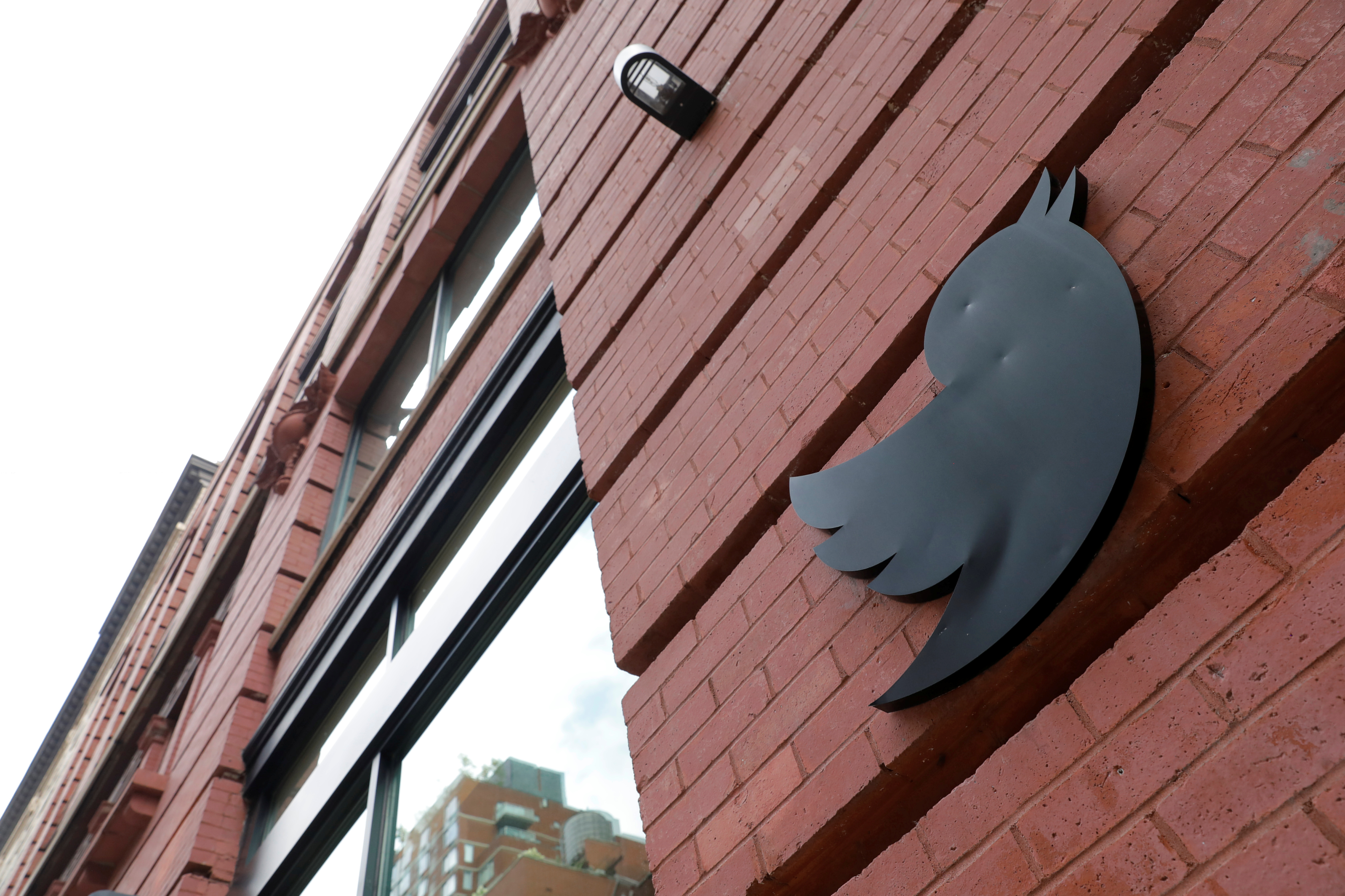A logo is seen on the New York Twitter offices in New York City